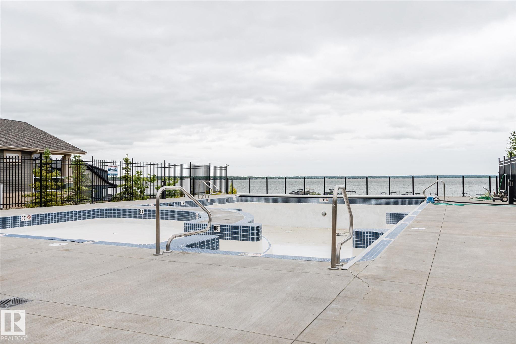 611 55101 Ste Anne Trail, Rural Lac Ste. Anne County, AB - Outdoor With In Ground Pool