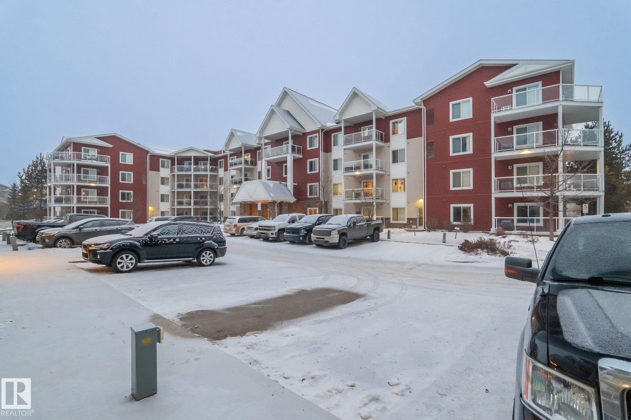 View of uncovered parking lot - 207 2203 44 Avenue, Edmonton, AB - Outdoor With Facade