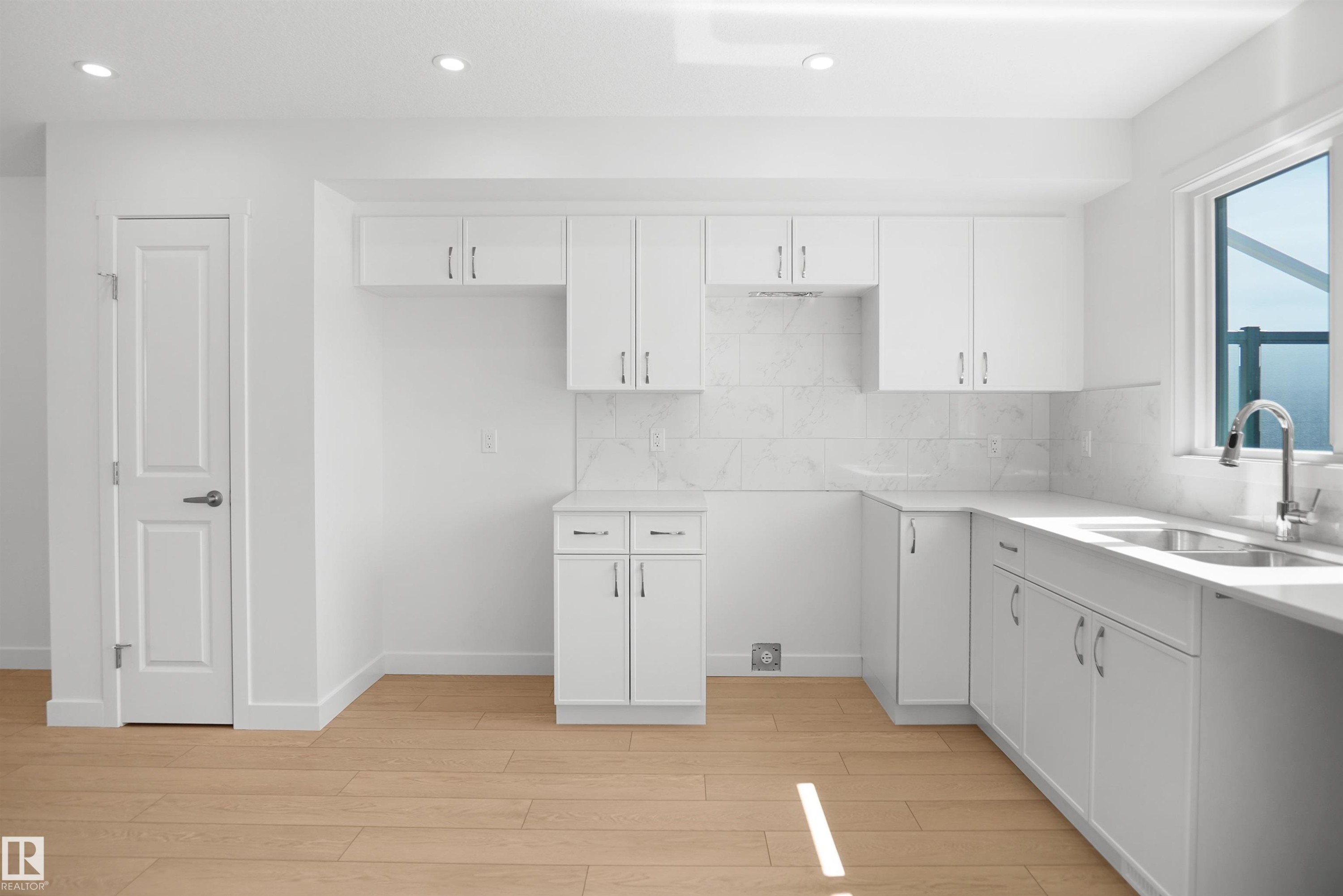 922 19 Avenue Nw, Edmonton, AB - Indoor Photo Showing Kitchen With Double Sink