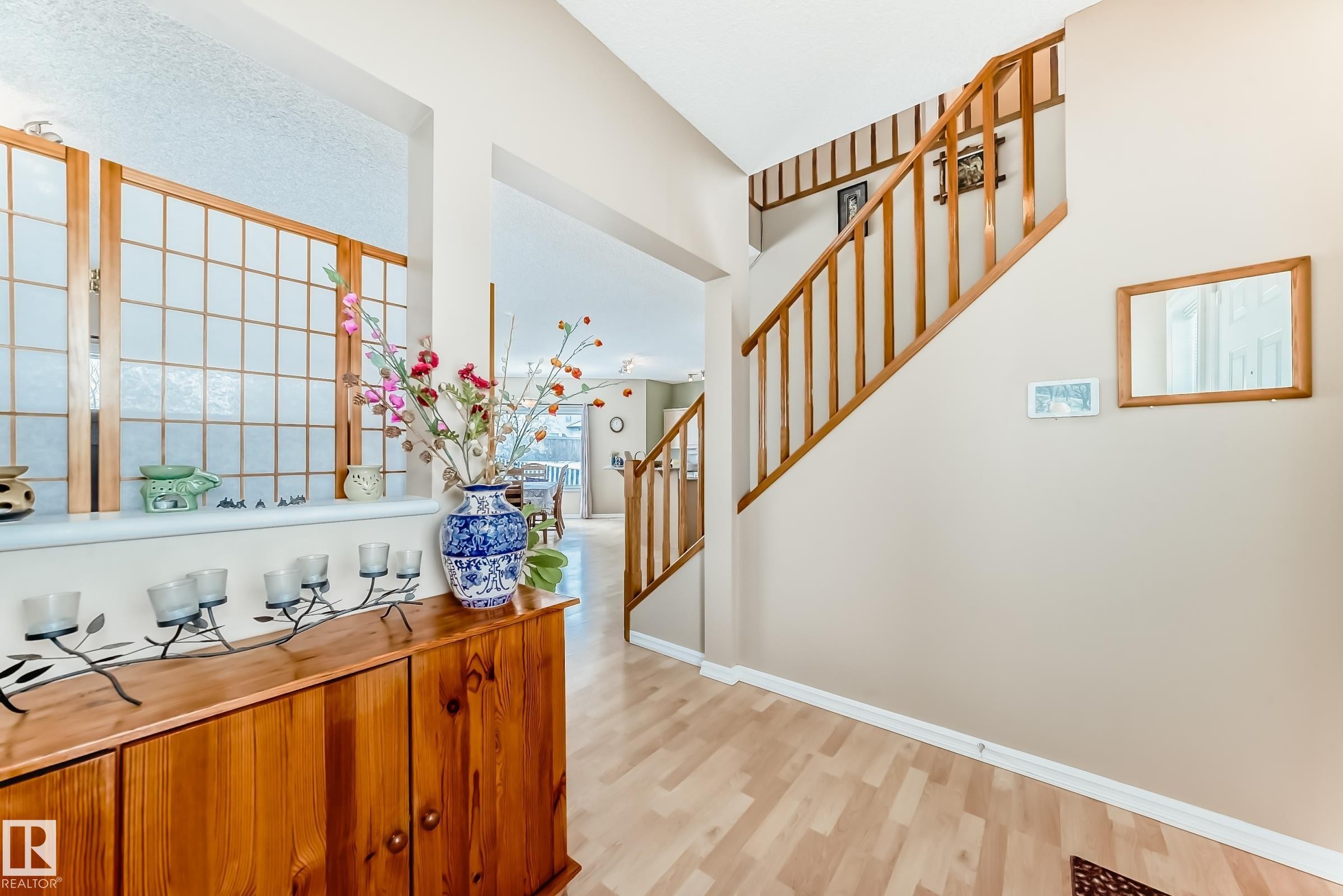 Interior space featuring stairway and light wood-style floors - 4619 151 Avenue, Edmonton, AB - Indoor Photo Showing Other Room