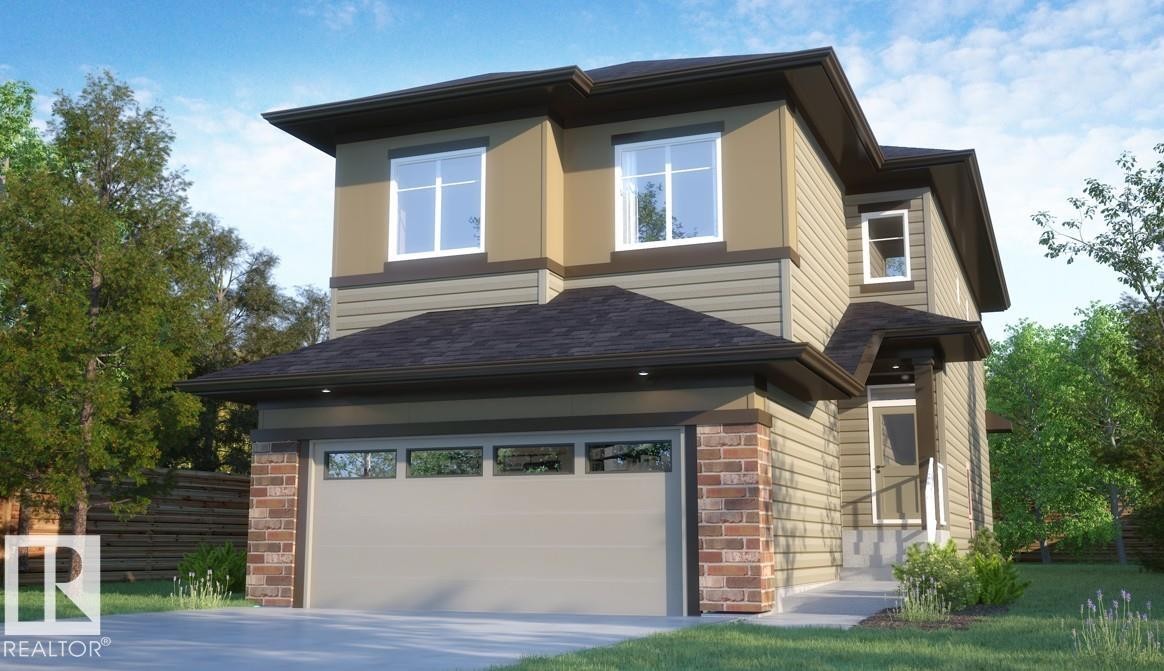 View of front facade featuring an attached garage, concrete driveway, and stone siding - 523 Ashgrove Circle, Leduc, AB - Outdoor