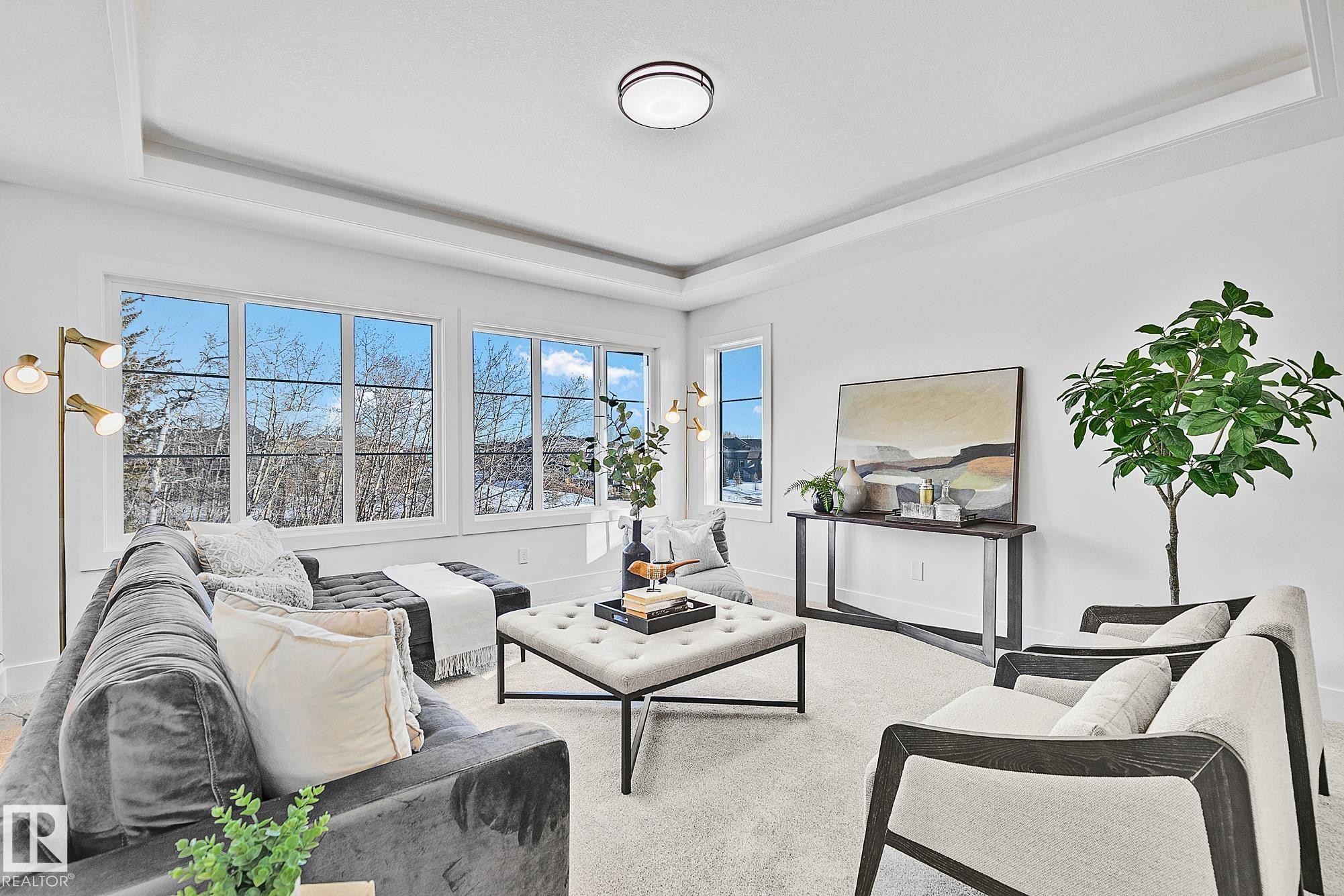 Living room with a tray ceiling - 523 Ashgrove Circle, Leduc, AB - Indoor Photo Showing Living Room