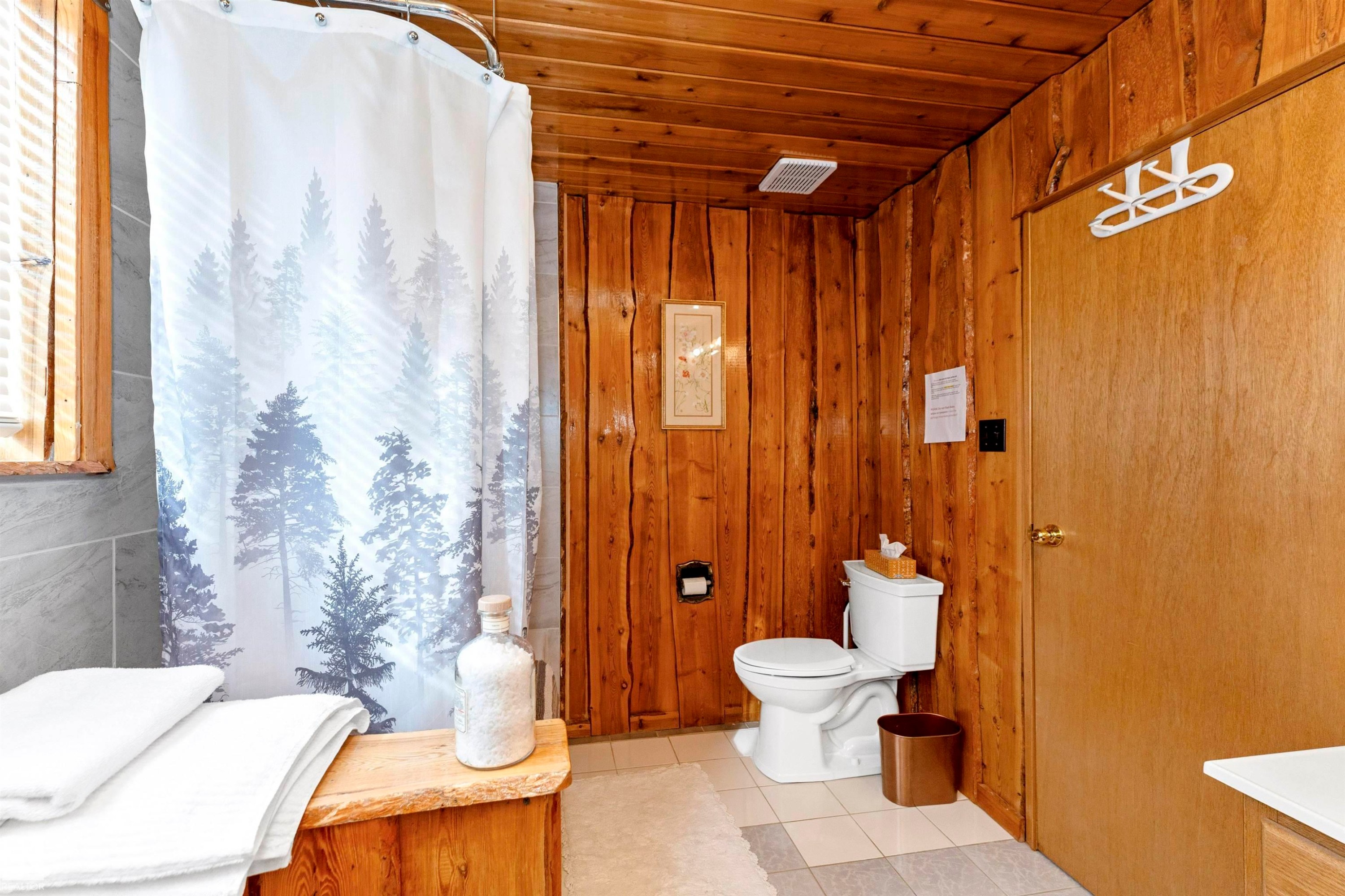 Bedroom with wood walls, wood finished floors, and wood ceiling - 516 5 Street, Rural Lac Ste. Anne County, AB - Indoor Photo Showing Bedroom