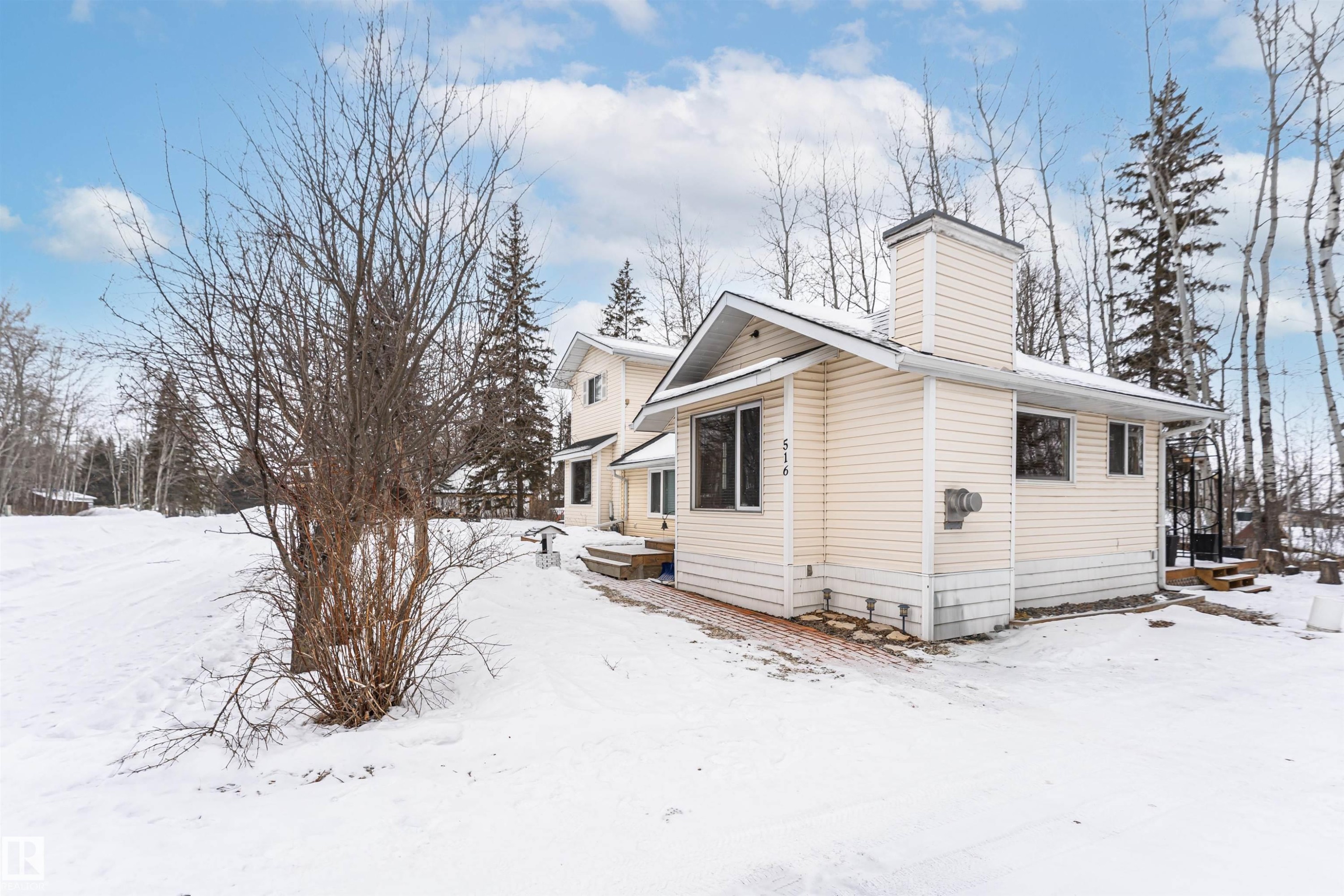 View of snow covered exterior - 516 5 Street, Rural Lac Ste. Anne County, AB - Outdoor