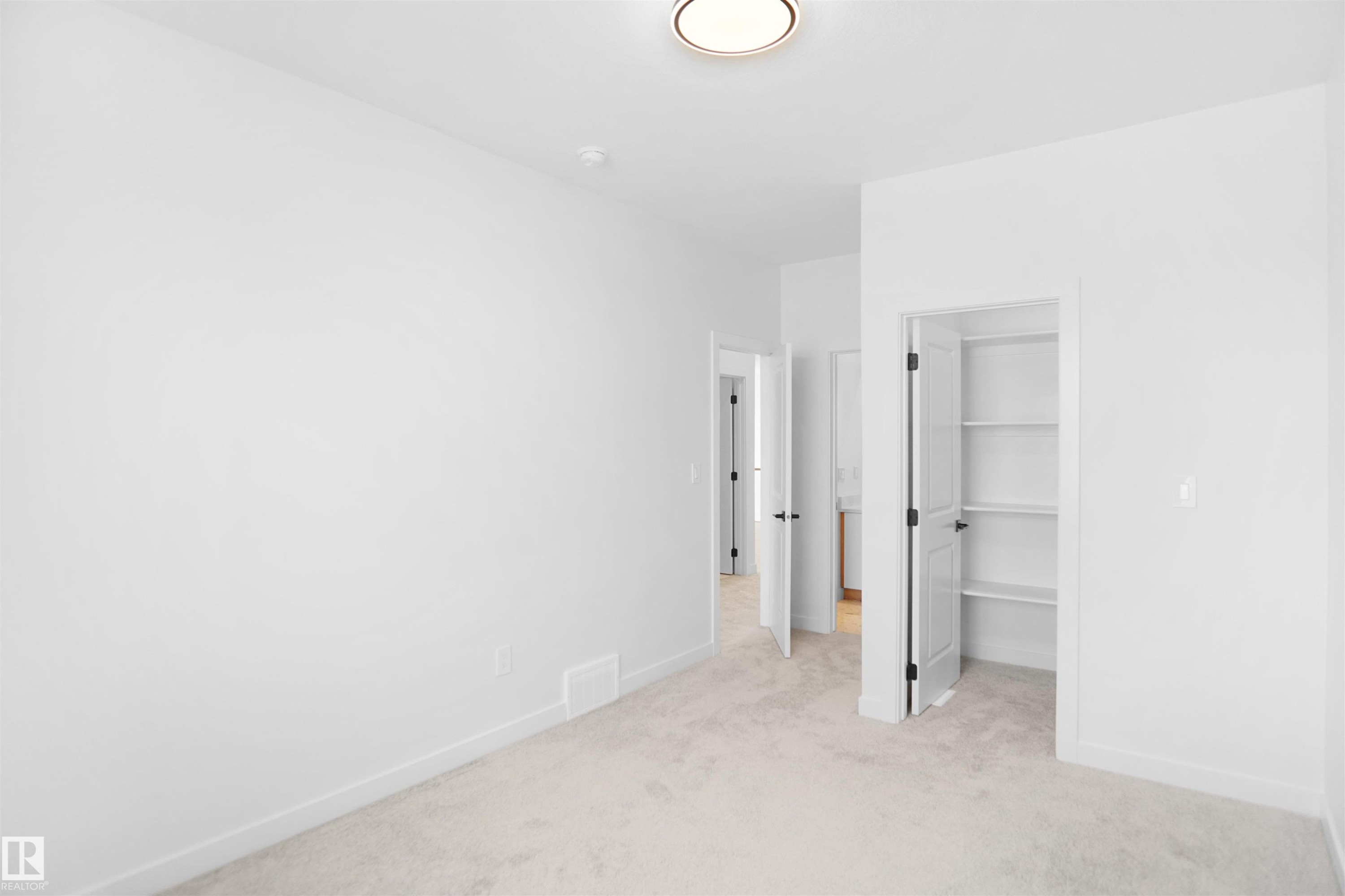 11 Trill Point(E), Spruce Grove, AB - Indoor Photo Showing Other Room