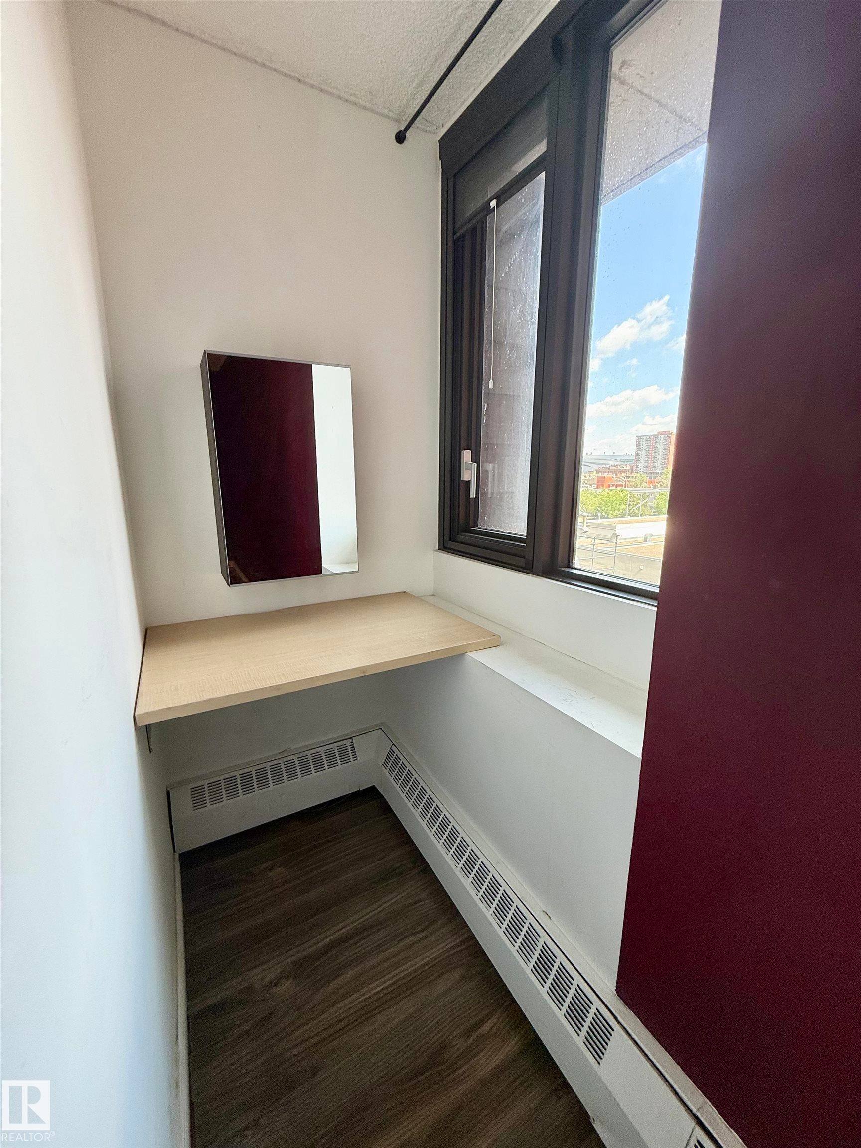 #409 10145 109 St, Edmonton, AB - Indoor Photo Showing Other Room