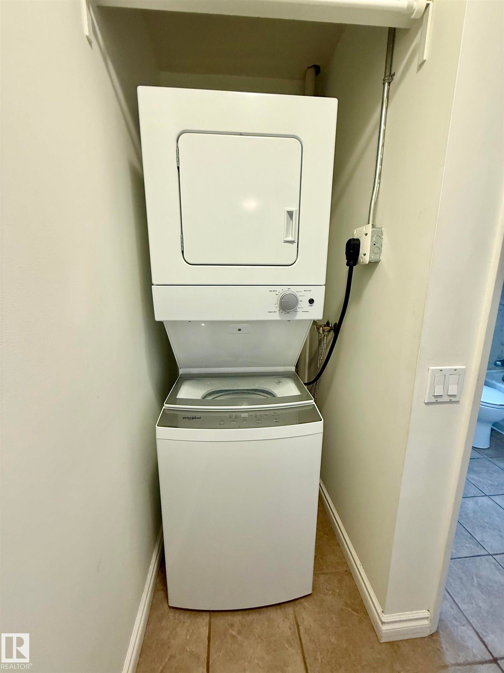 #409 10145 109 St, Edmonton, AB - Indoor Photo Showing Laundry Room