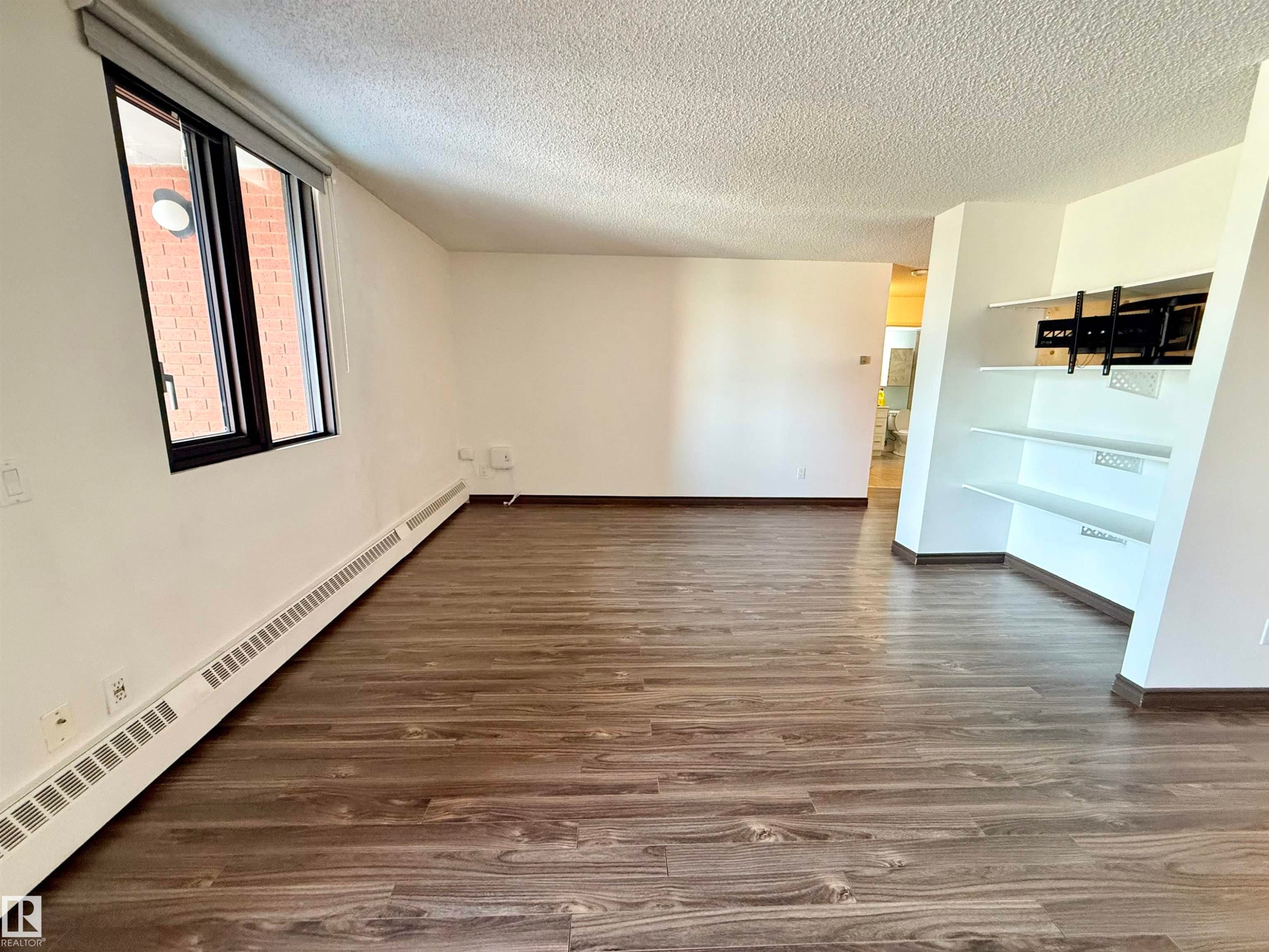 #409 10145 109 St, Edmonton, AB - Indoor Photo Showing Other Room