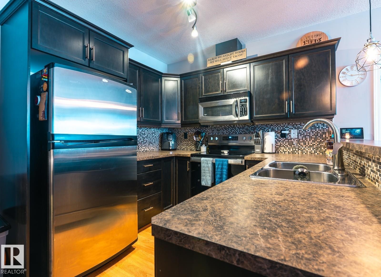 9 671 Silver Berry Road Nw, Edmonton, AB - Indoor Photo Showing Kitchen With Double Sink With Upgraded Kitchen