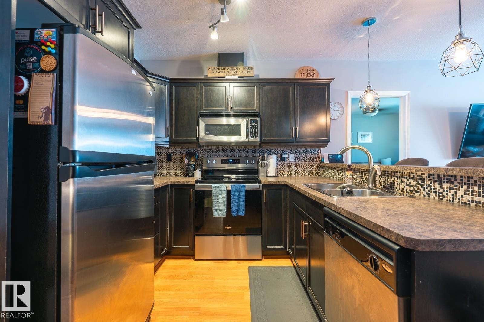 9 671 Silver Berry Road Nw, Edmonton, AB - Indoor Photo Showing Kitchen With Double Sink With Upgraded Kitchen