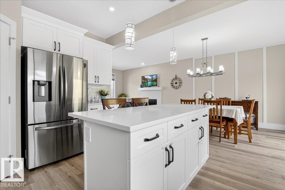 80 Maple Crescent, Gibbons, AB - Indoor Photo Showing Kitchen With Upgraded Kitchen