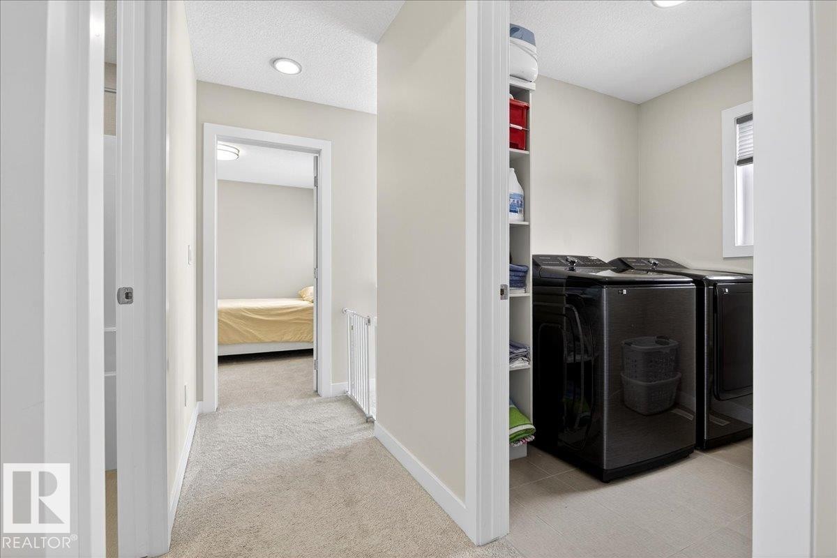 80 Maple Crescent, Gibbons, AB - Indoor Photo Showing Laundry Room