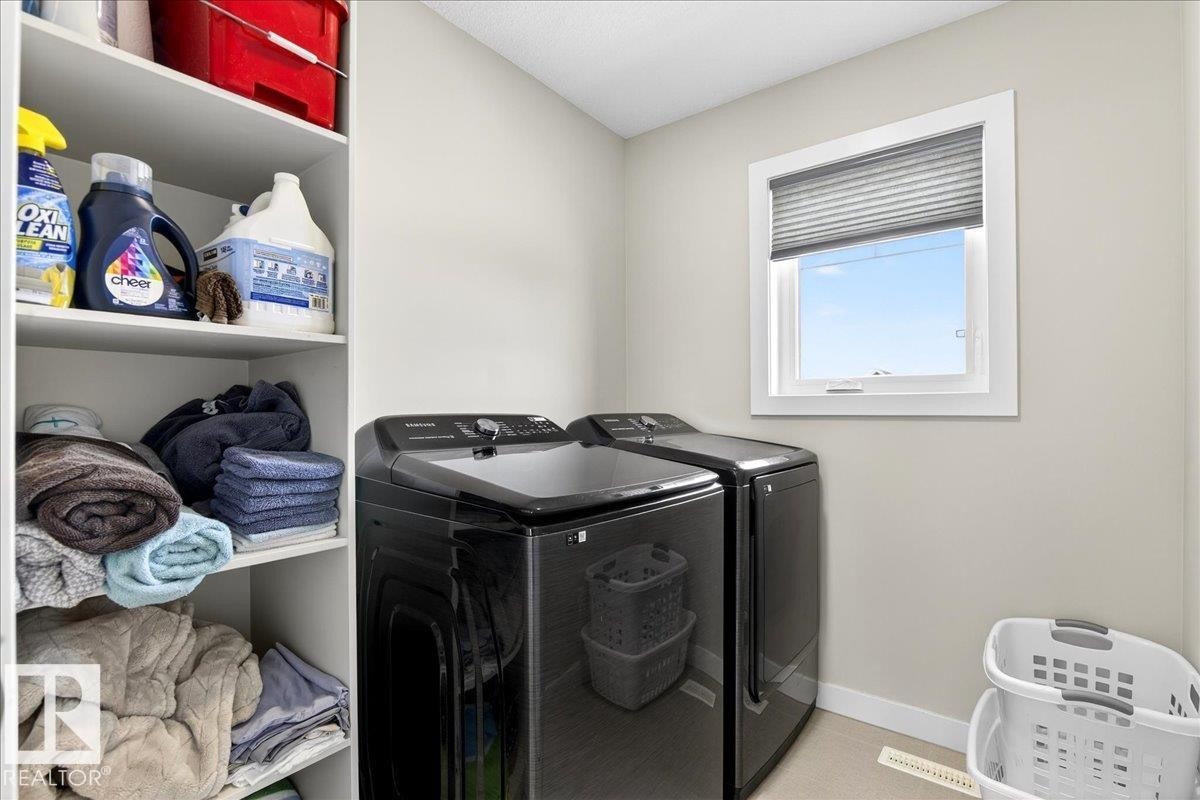On the 2nd floor - 80 Maple Crescent, Gibbons, AB - Indoor Photo Showing Laundry Room