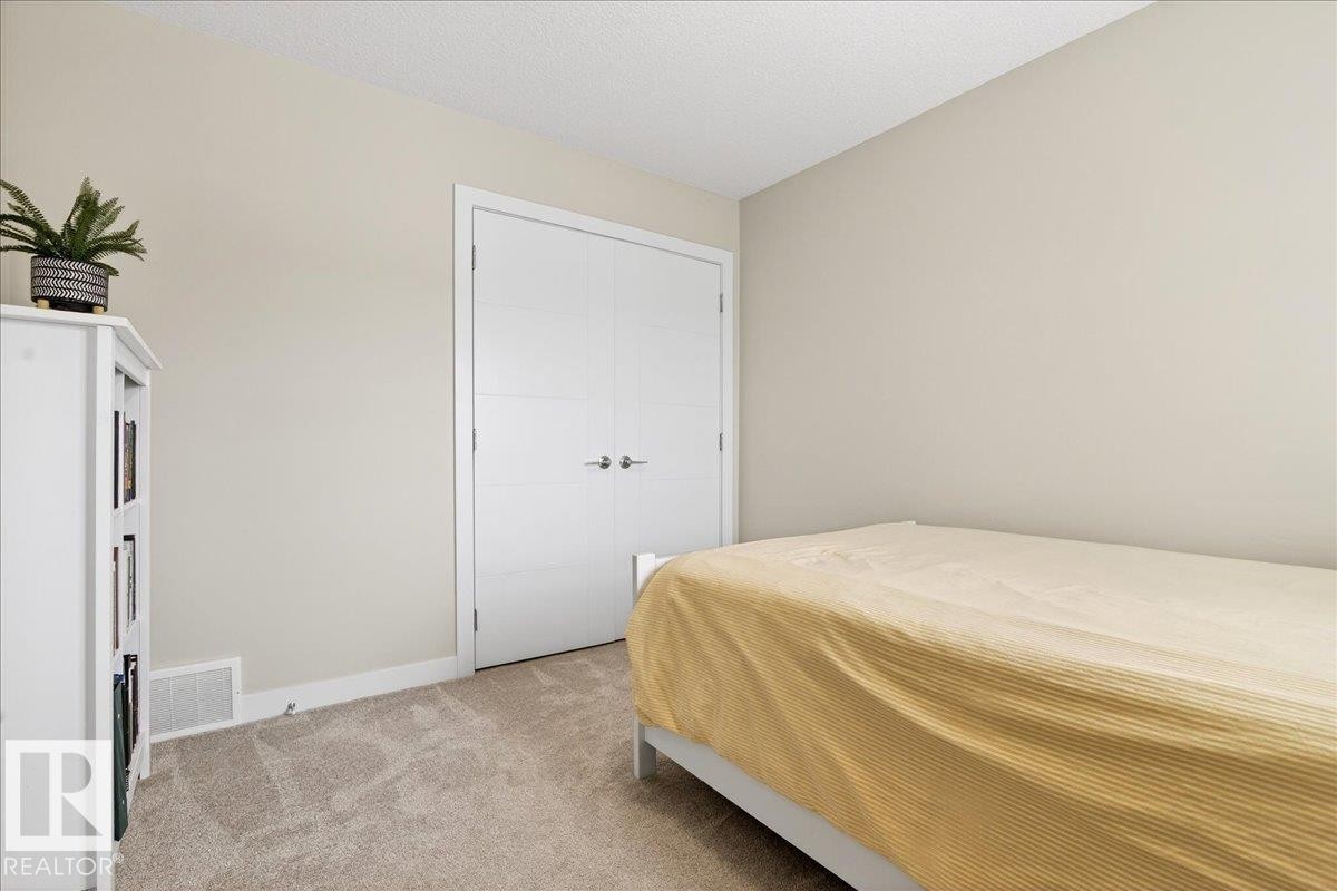 80 Maple Crescent, Gibbons, AB - Indoor Photo Showing Bedroom