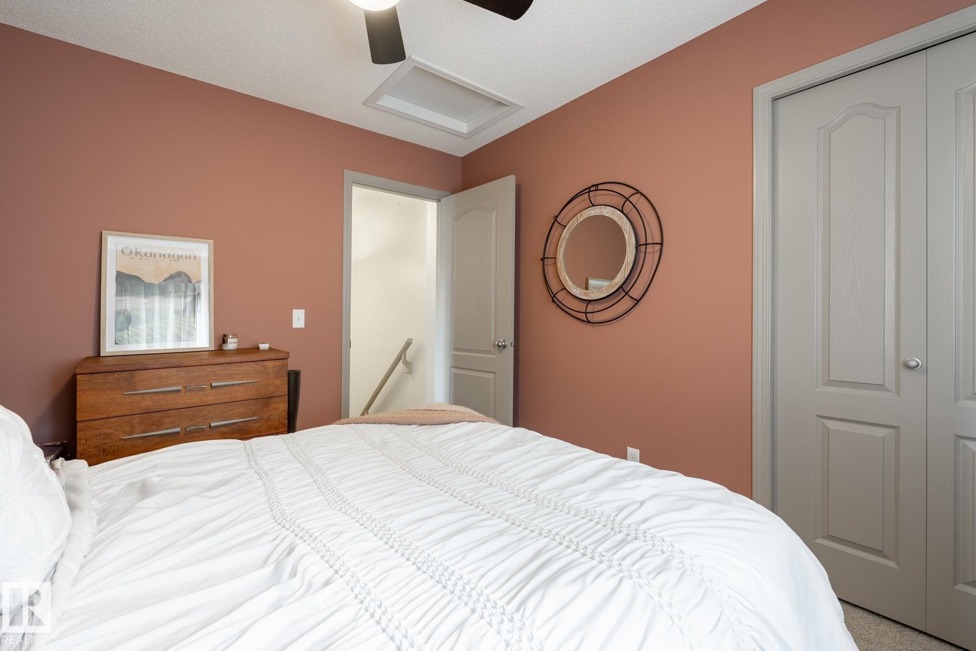 Bedroom with a closet and ceiling fan - 3312 17B Avenue, Edmonton, AB - Indoor Photo Showing Bedroom