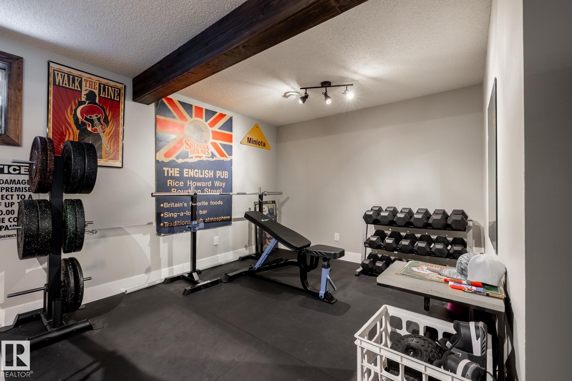 Exercise room featuring a textured ceiling and beamed ceiling - 3312 17B Avenue, Edmonton, AB - Indoor Photo Showing Gym Room