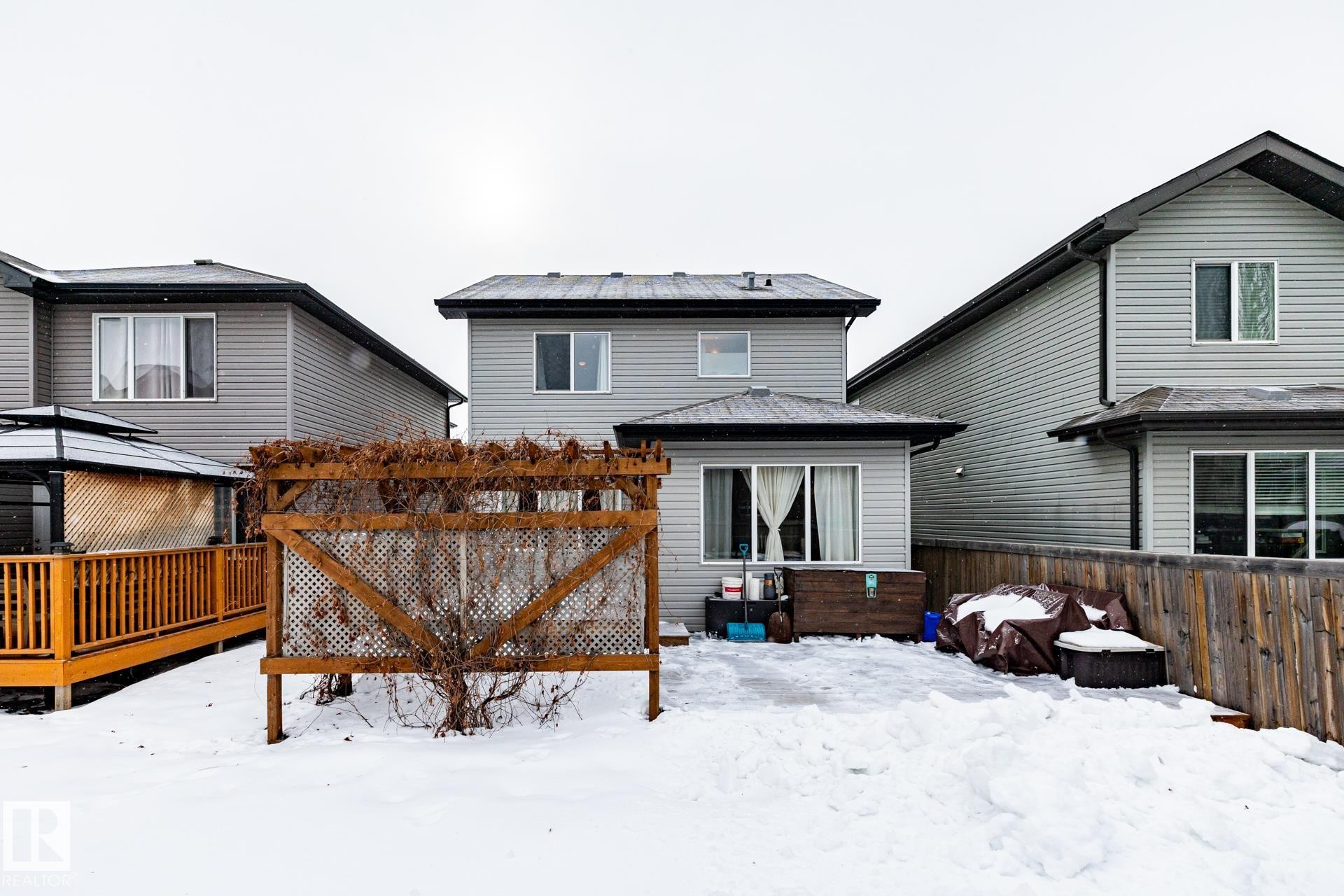 Back of house featuring a deck - 3312 17B Avenue, Edmonton, AB - Outdoor With Exterior