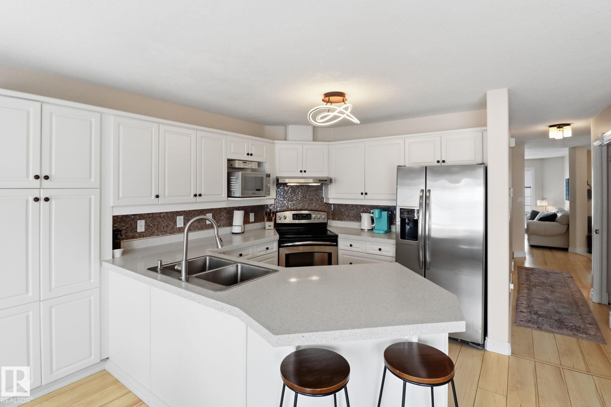 38 882 Ryan Place, Edmonton, AB - Indoor Photo Showing Kitchen With Stainless Steel Kitchen With Double Sink