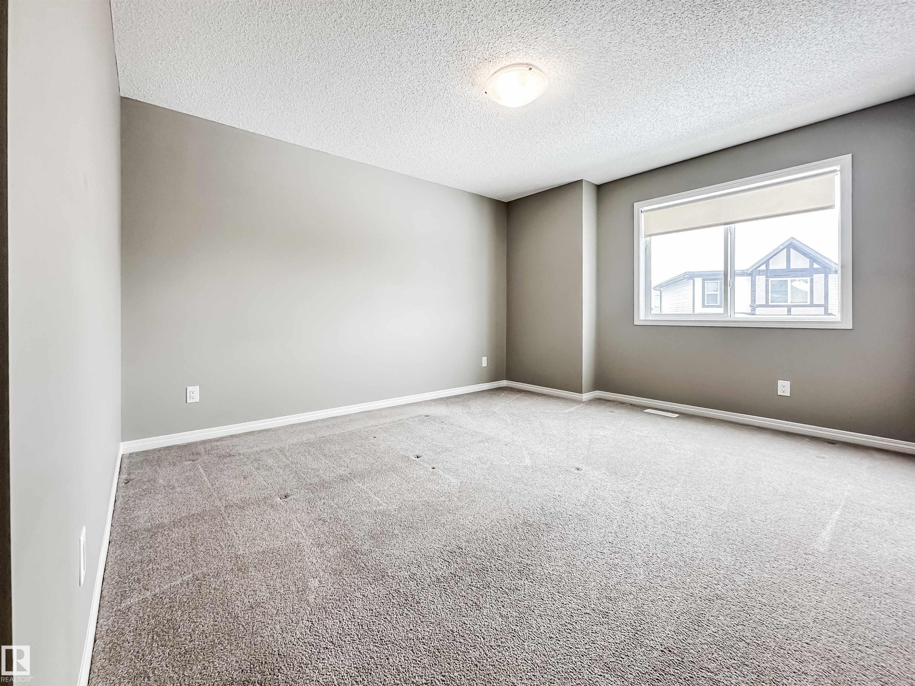 100 2072 Wonnacott Way, Edmonton, AB - Indoor Photo Showing Other Room