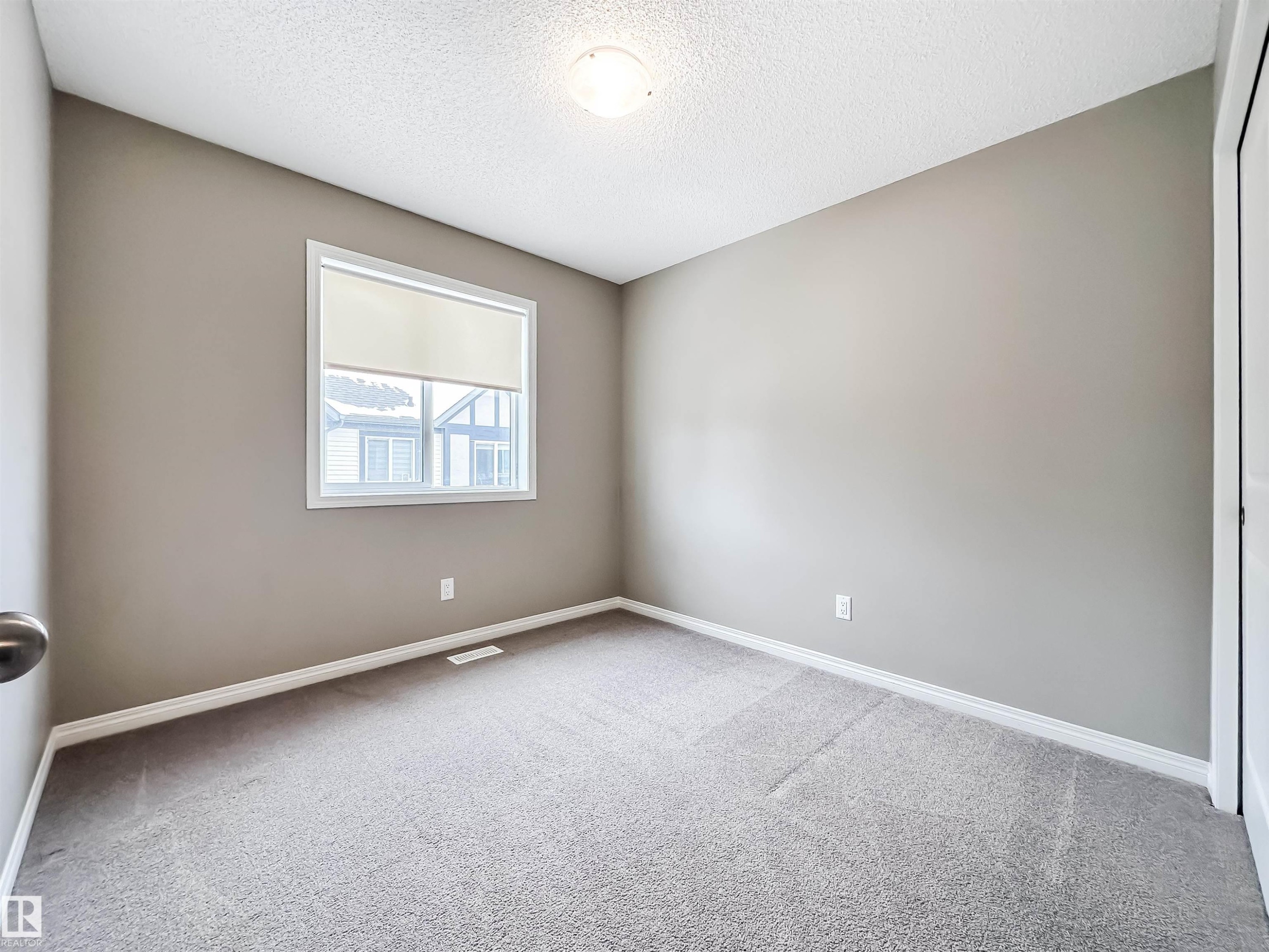 100 2072 Wonnacott Way, Edmonton, AB - Indoor Photo Showing Other Room