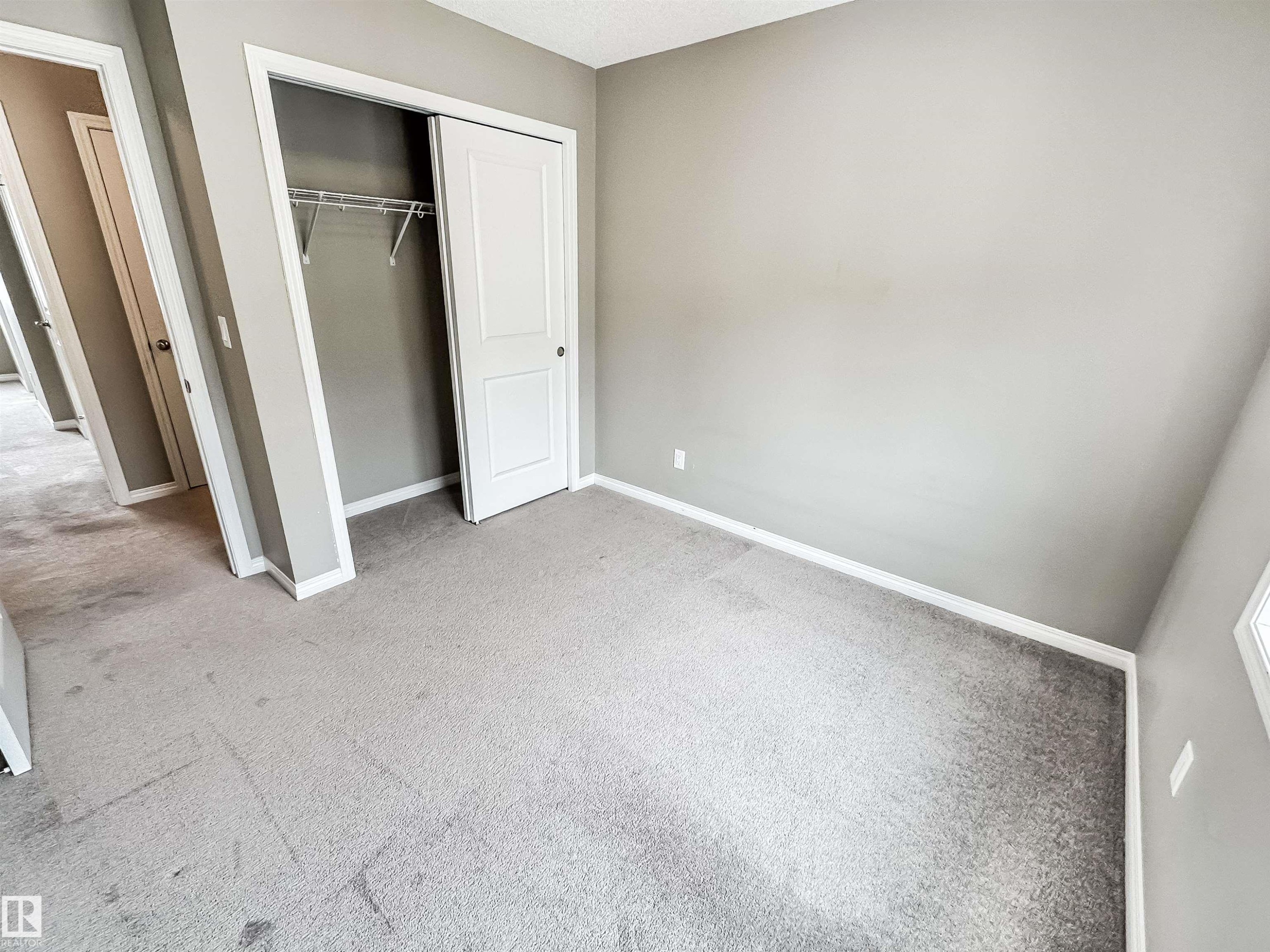 100 2072 Wonnacott Way, Edmonton, AB - Indoor Photo Showing Other Room