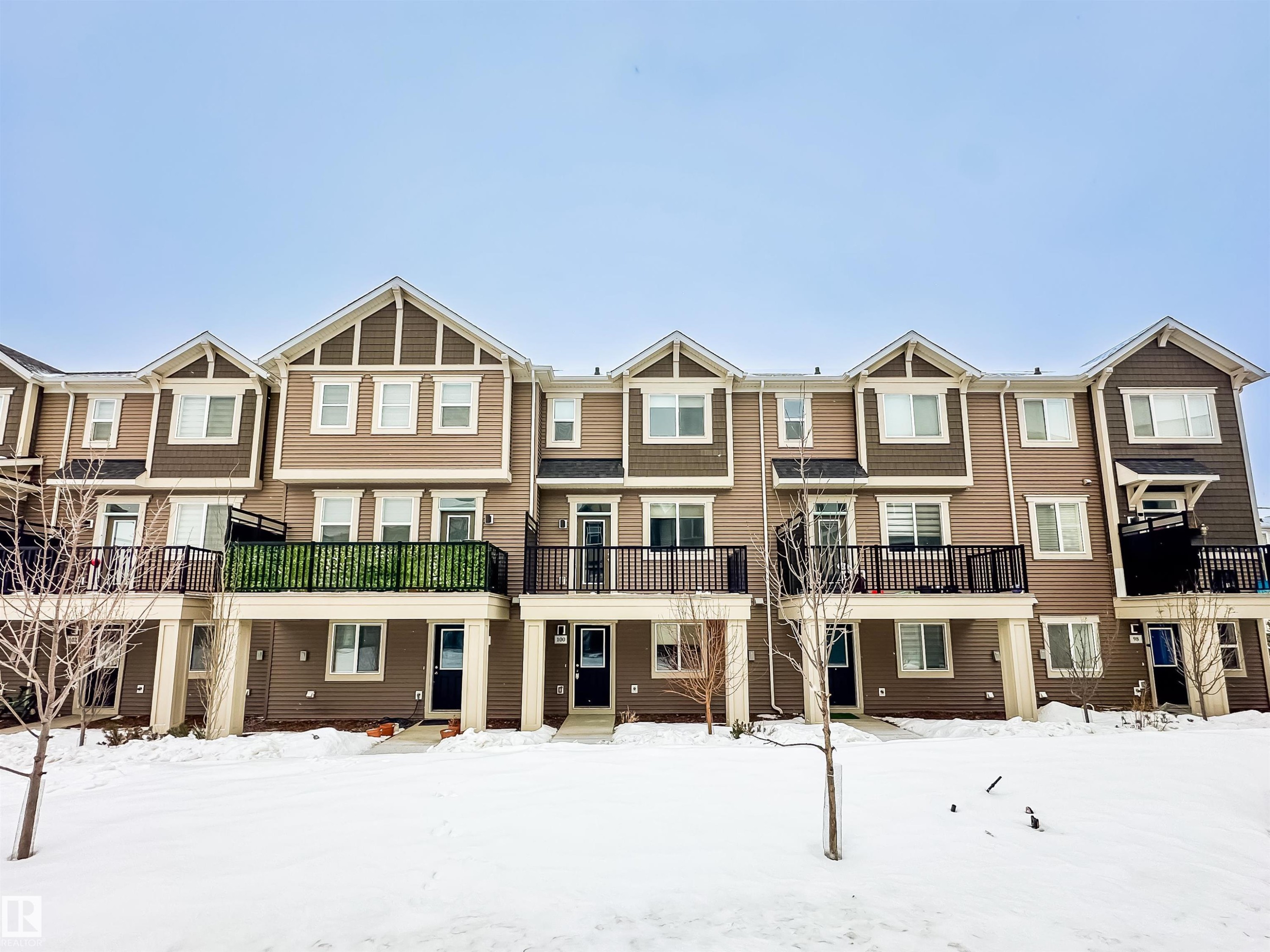 100 2072 Wonnacott Way, Edmonton, AB - Outdoor With Balcony With Facade