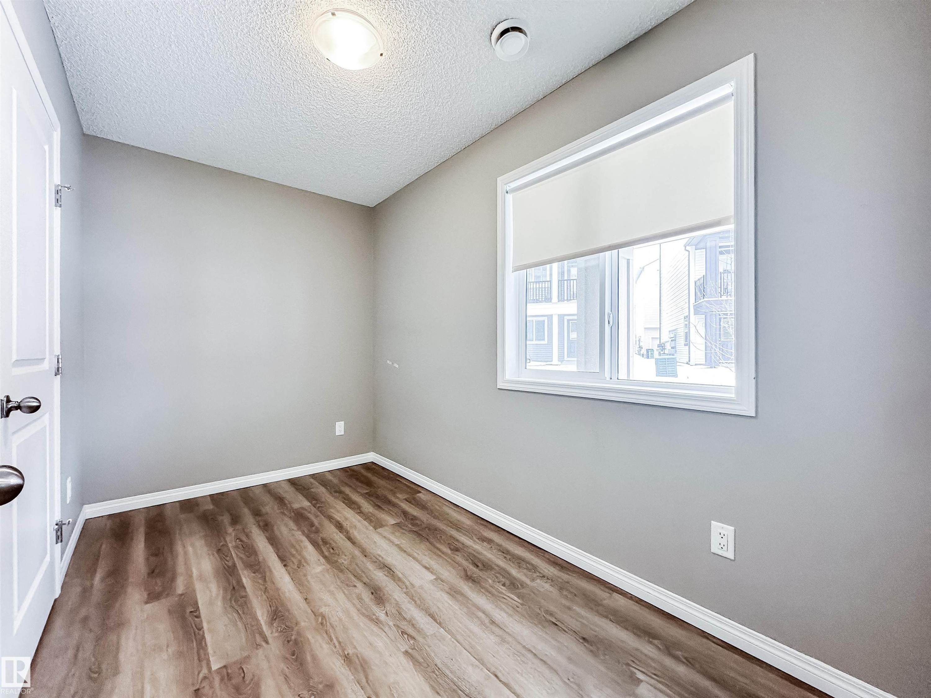 100 2072 Wonnacott Way, Edmonton, AB - Indoor Photo Showing Other Room