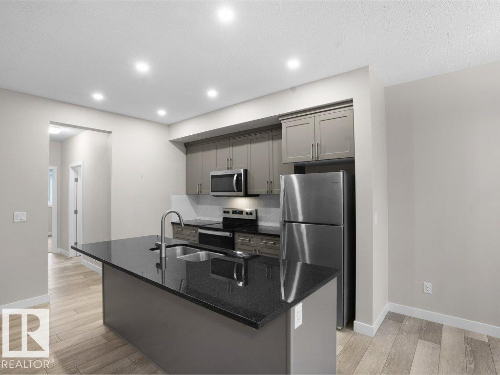 20329 15A Avenue, Edmonton, AB - Indoor Photo Showing Kitchen With Stainless Steel Kitchen With Double Sink