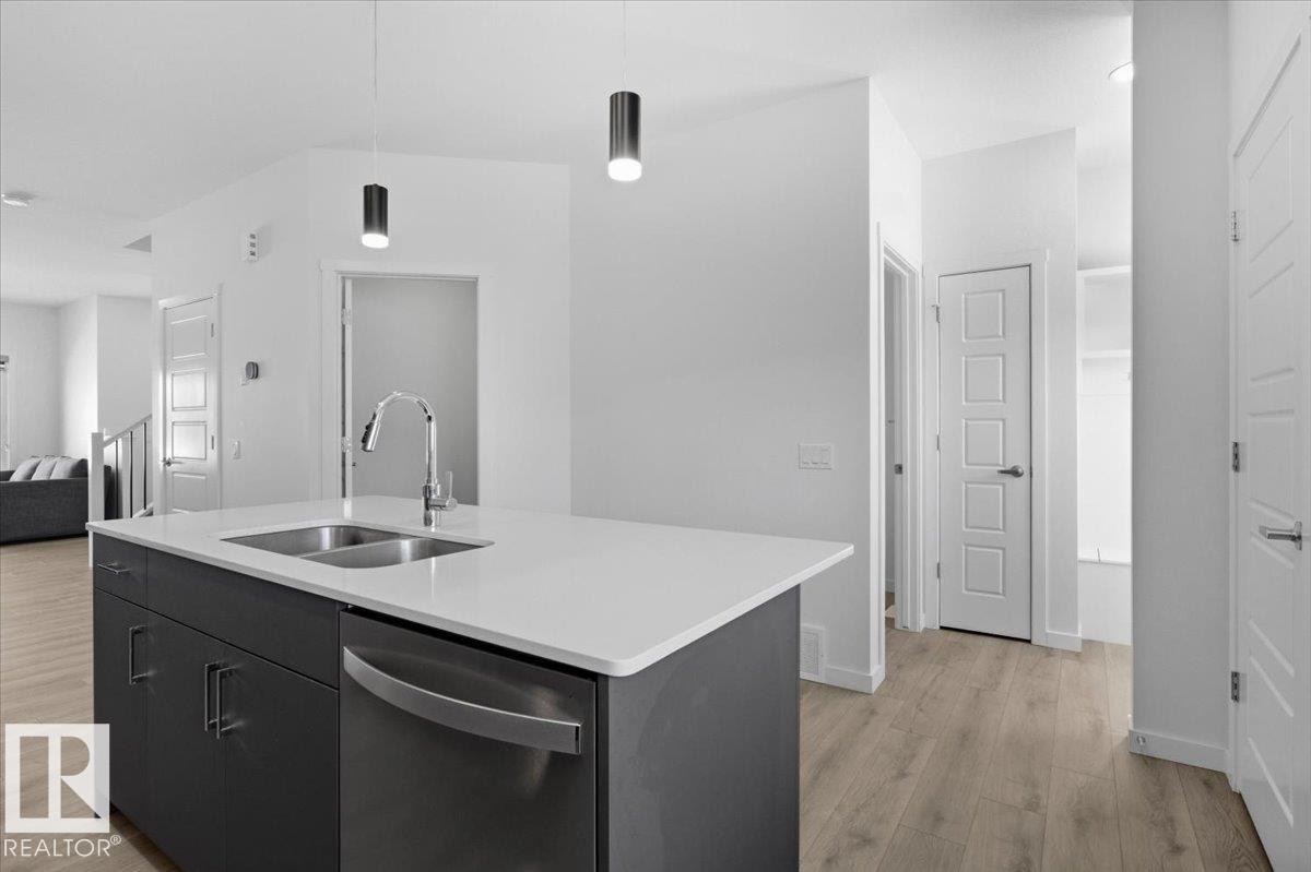 3323 Erlanger Bend, Edmonton, AB - Indoor Photo Showing Kitchen With Double Sink