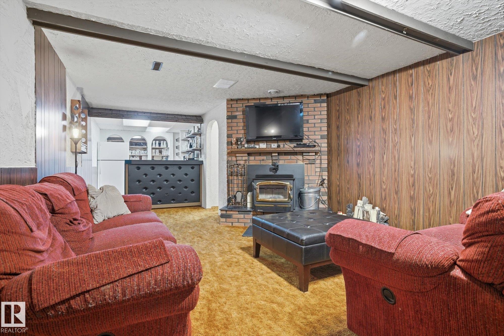 6903 12 Avenue, Edmonton, AB - Indoor Photo Showing Living Room With Fireplace