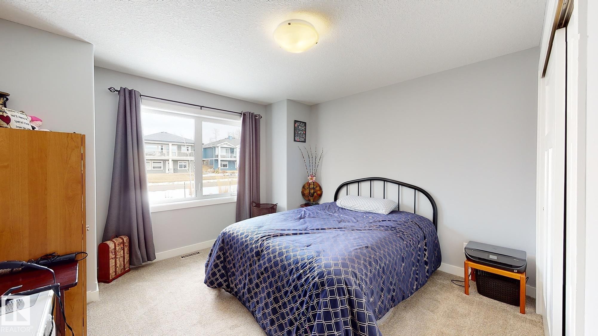 55101 Ste. Anne Trail, Rural Lac Ste. Anne County, AB - Indoor Photo Showing Bedroom