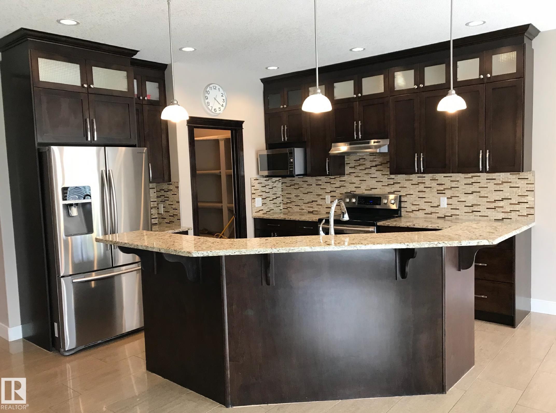 Edmonton, AB - Indoor Photo Showing Kitchen With Upgraded Kitchen