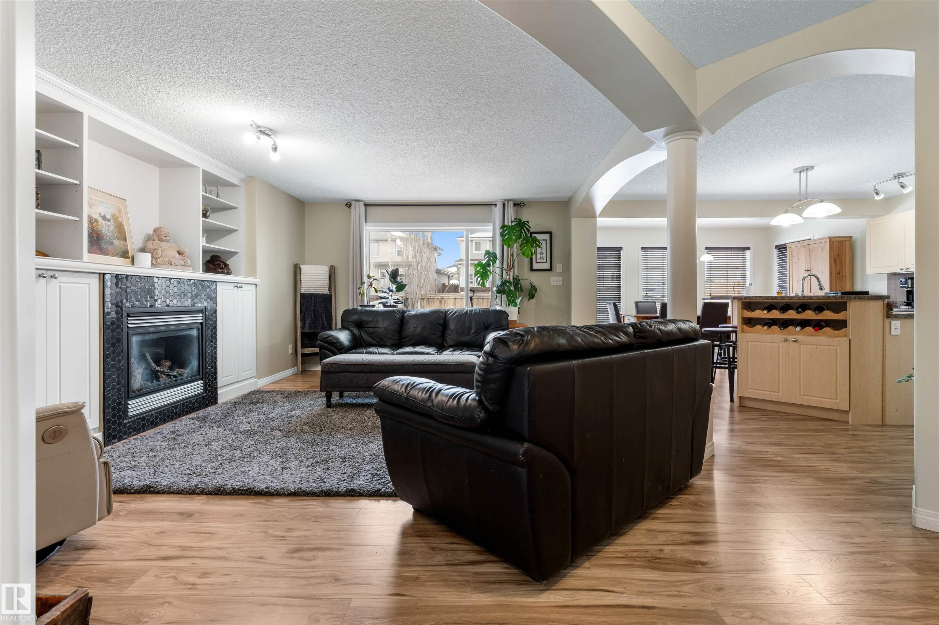 7422 Singer Landing, Edmonton, AB - Indoor Photo Showing Living Room With Fireplace