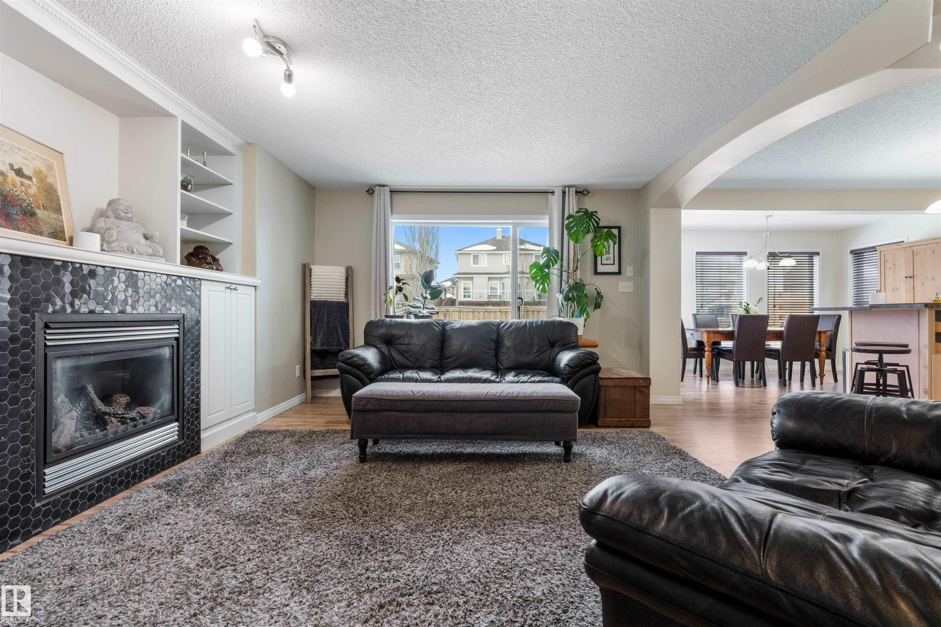 7422 Singer Landing, Edmonton, AB - Indoor Photo Showing Living Room With Fireplace