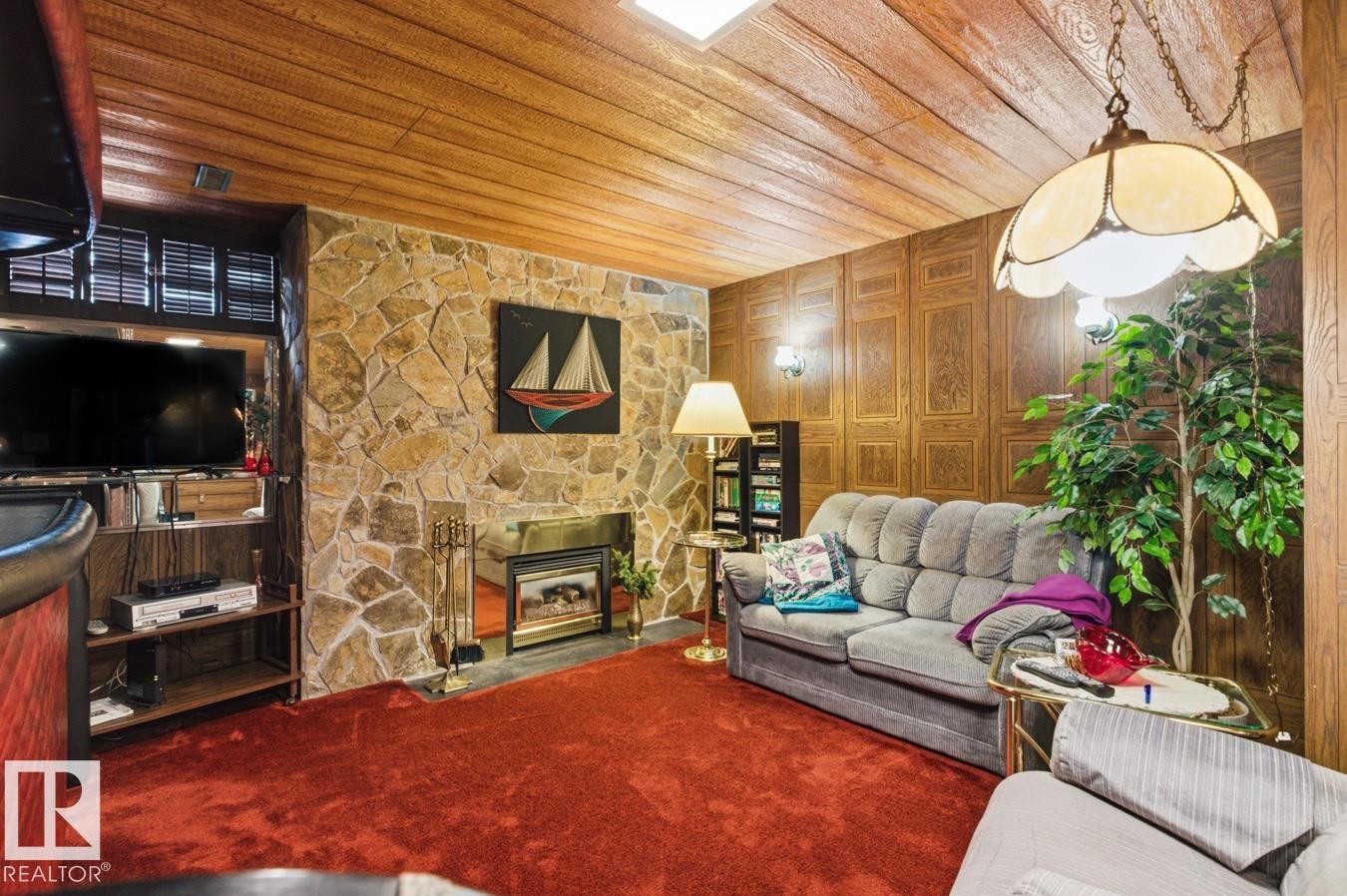 60 Peace River Drive, Devon, AB - Indoor Photo Showing Living Room With Fireplace