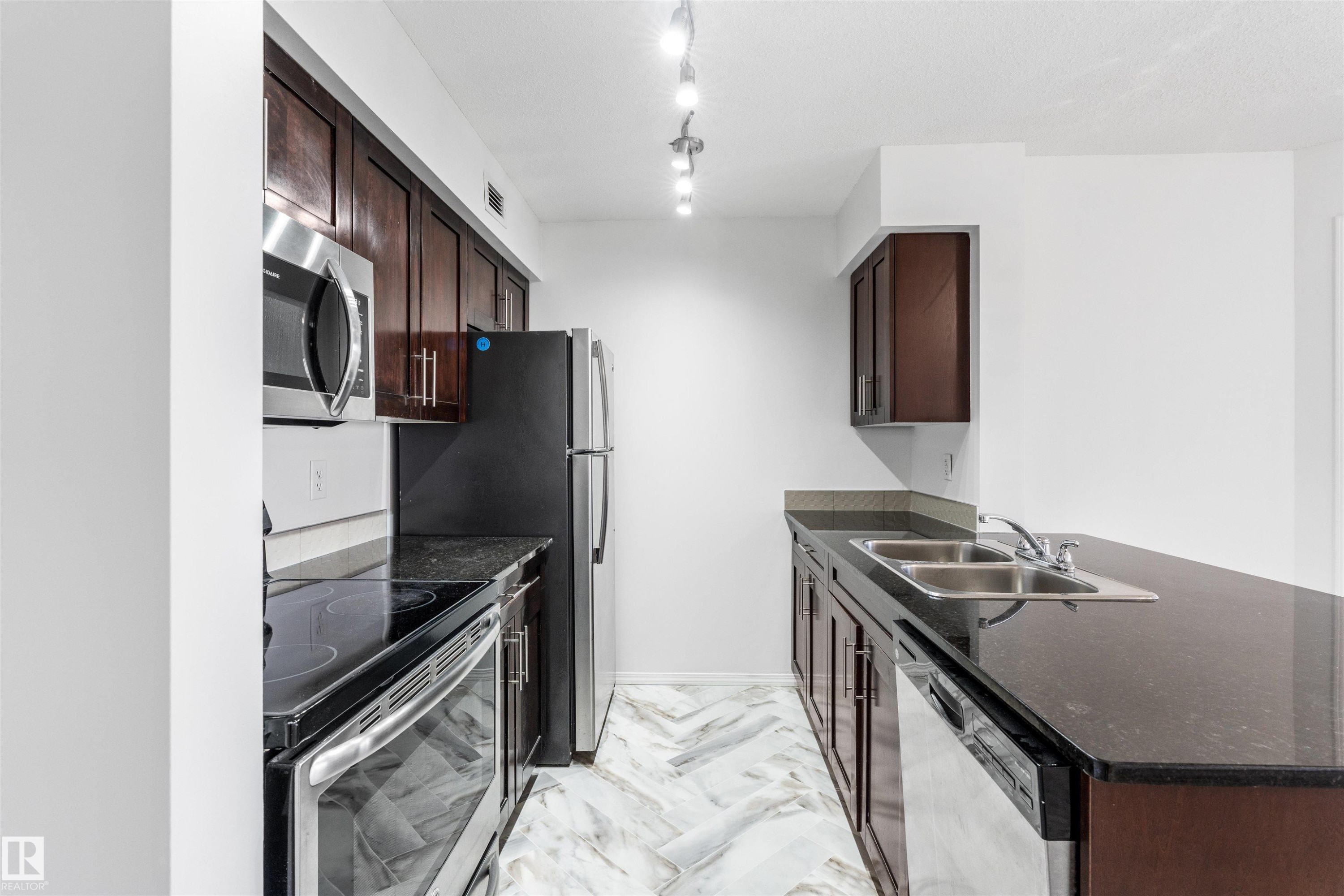 313 270 Mcconachie Drive, Edmonton, AB - Indoor Photo Showing Kitchen With Double Sink