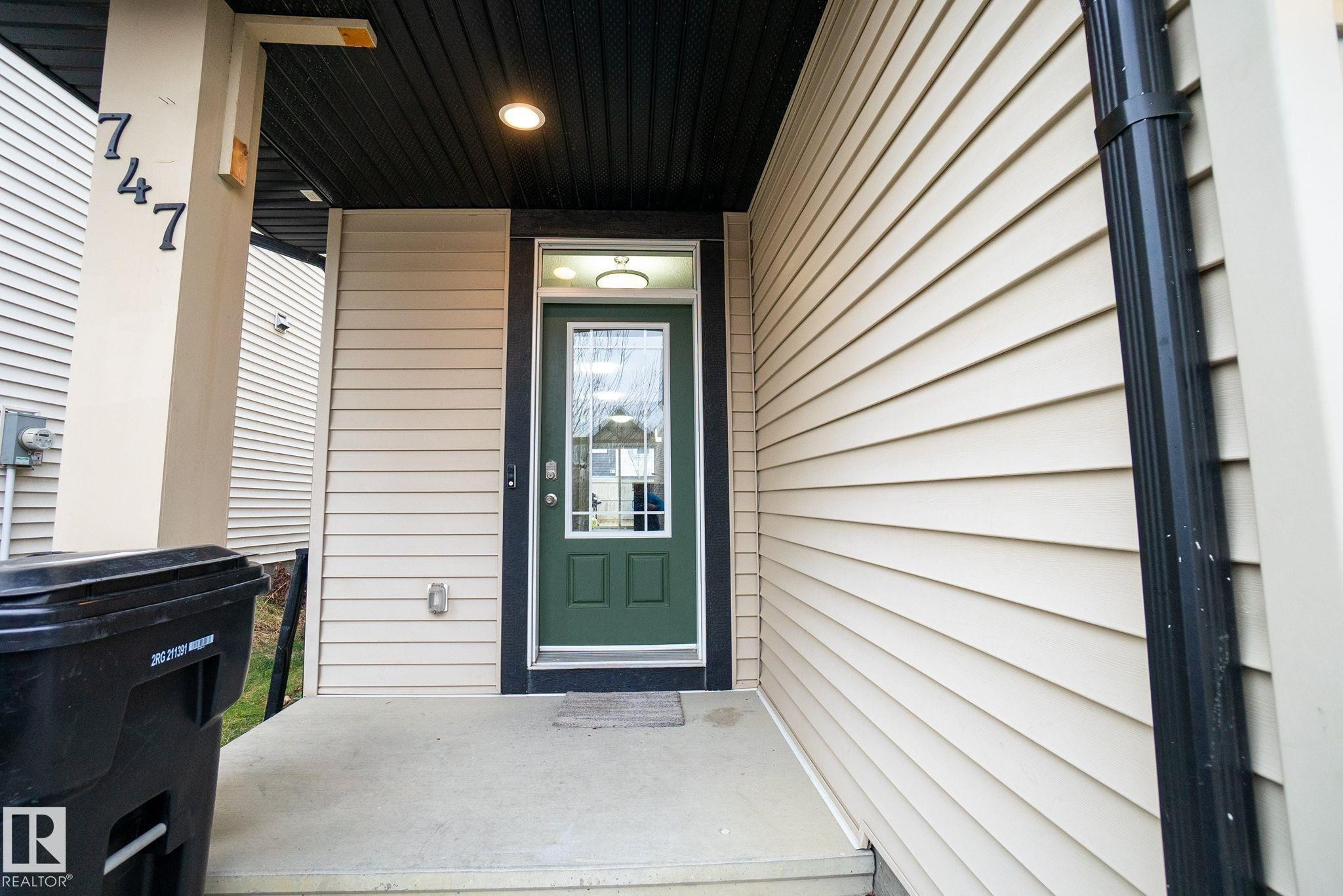 Entrance to property with a porch - Edmonton, AB - Outdoor With Exterior