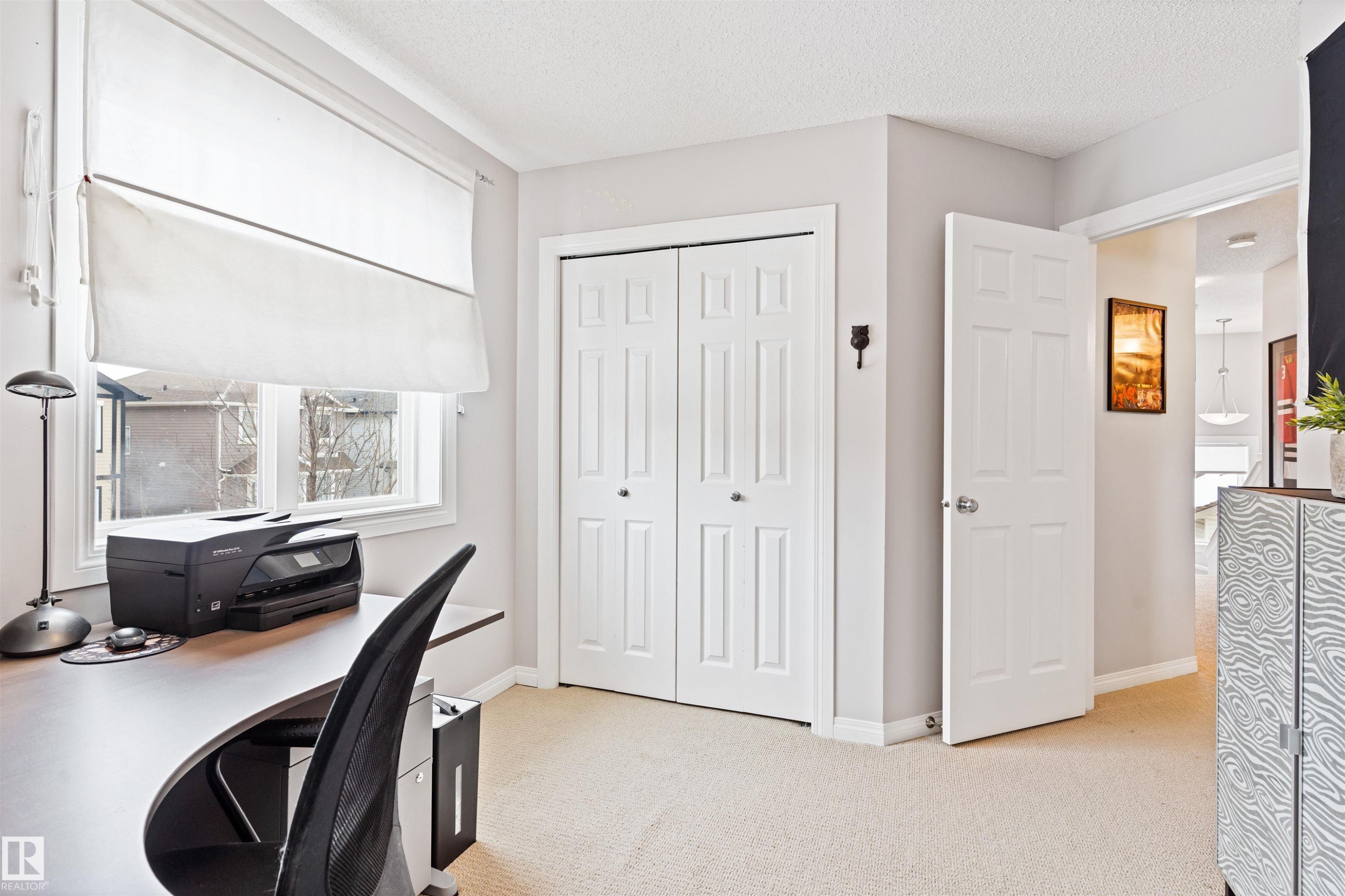Office space featuring light carpet and a textured ceiling - 7804 Schmid Place, Edmonton, AB - Indoor Photo Showing Office