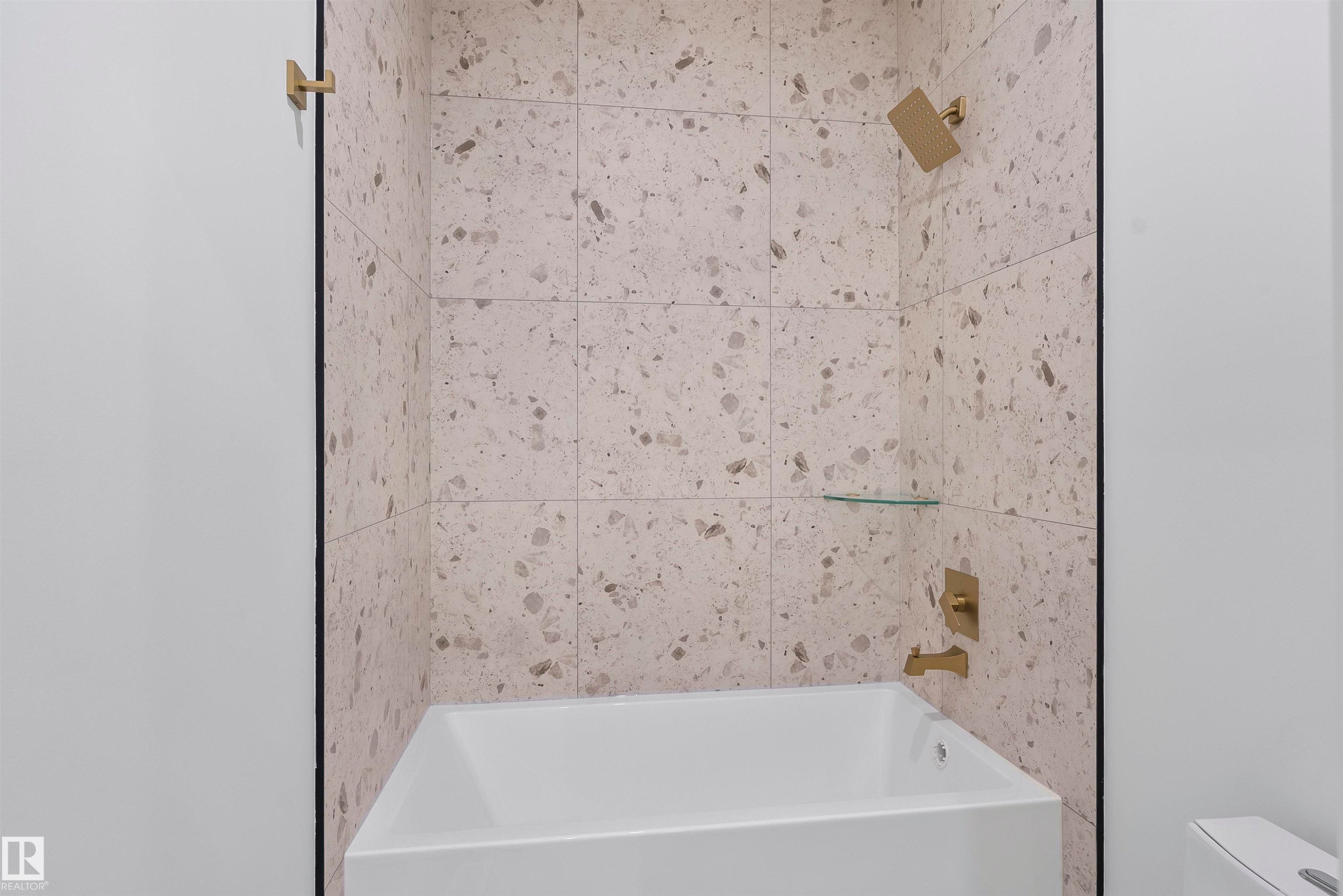 Bathroom with toilet and shower / bath combination - 13152 187 Avenue, Edmonton, AB - Indoor