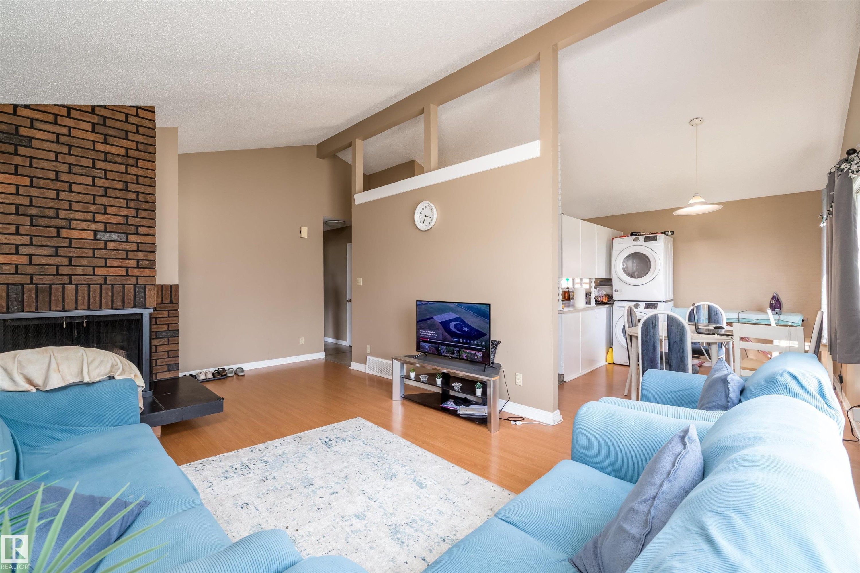 3620 42A Avenue, Edmonton, AB - Indoor Photo Showing Living Room With Fireplace