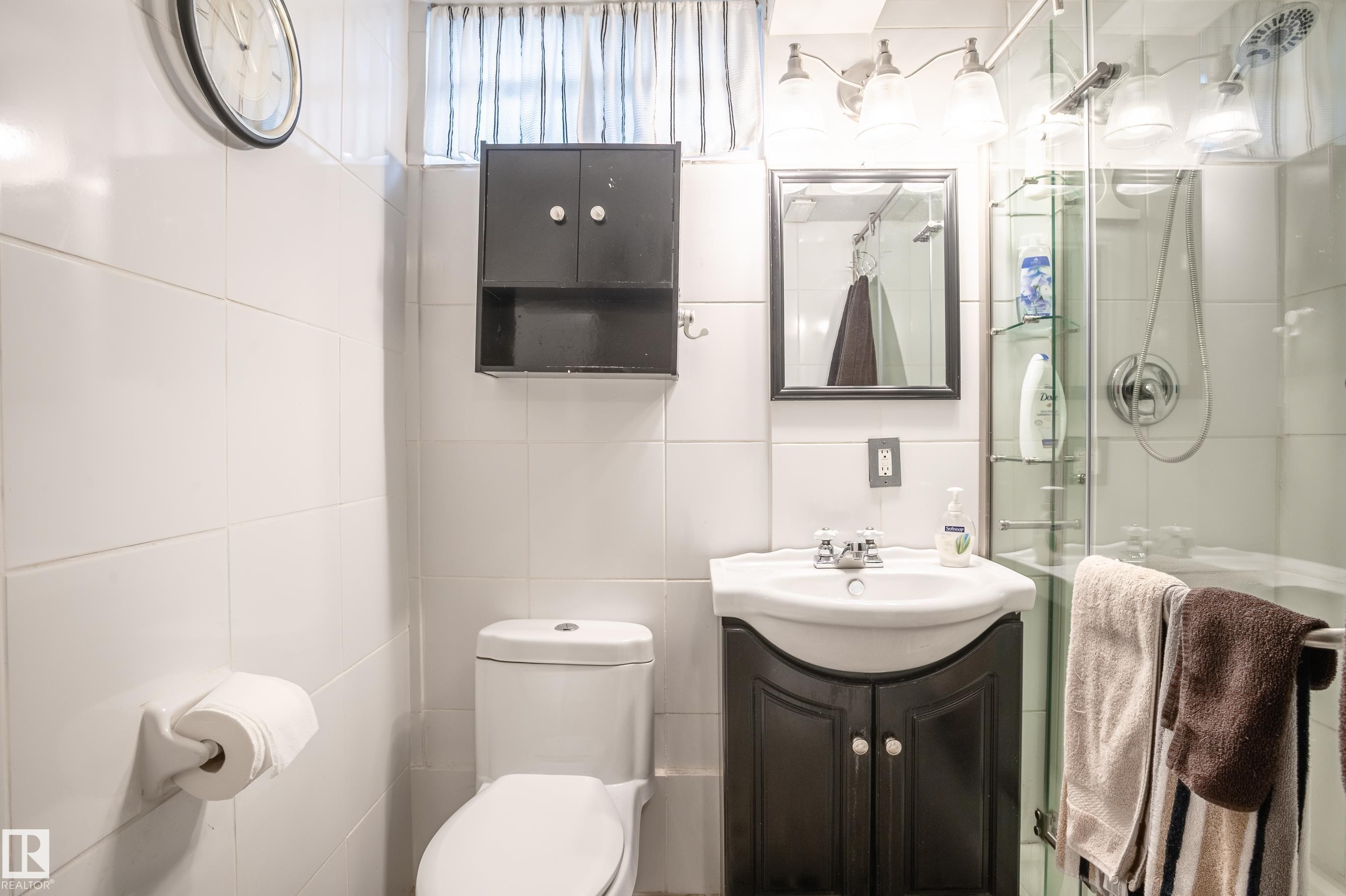 Full bathroom with vanity, a shower stall, and tile walls - 13420 113A St, Edmonton, AB - Indoor Photo Showing Bathroom