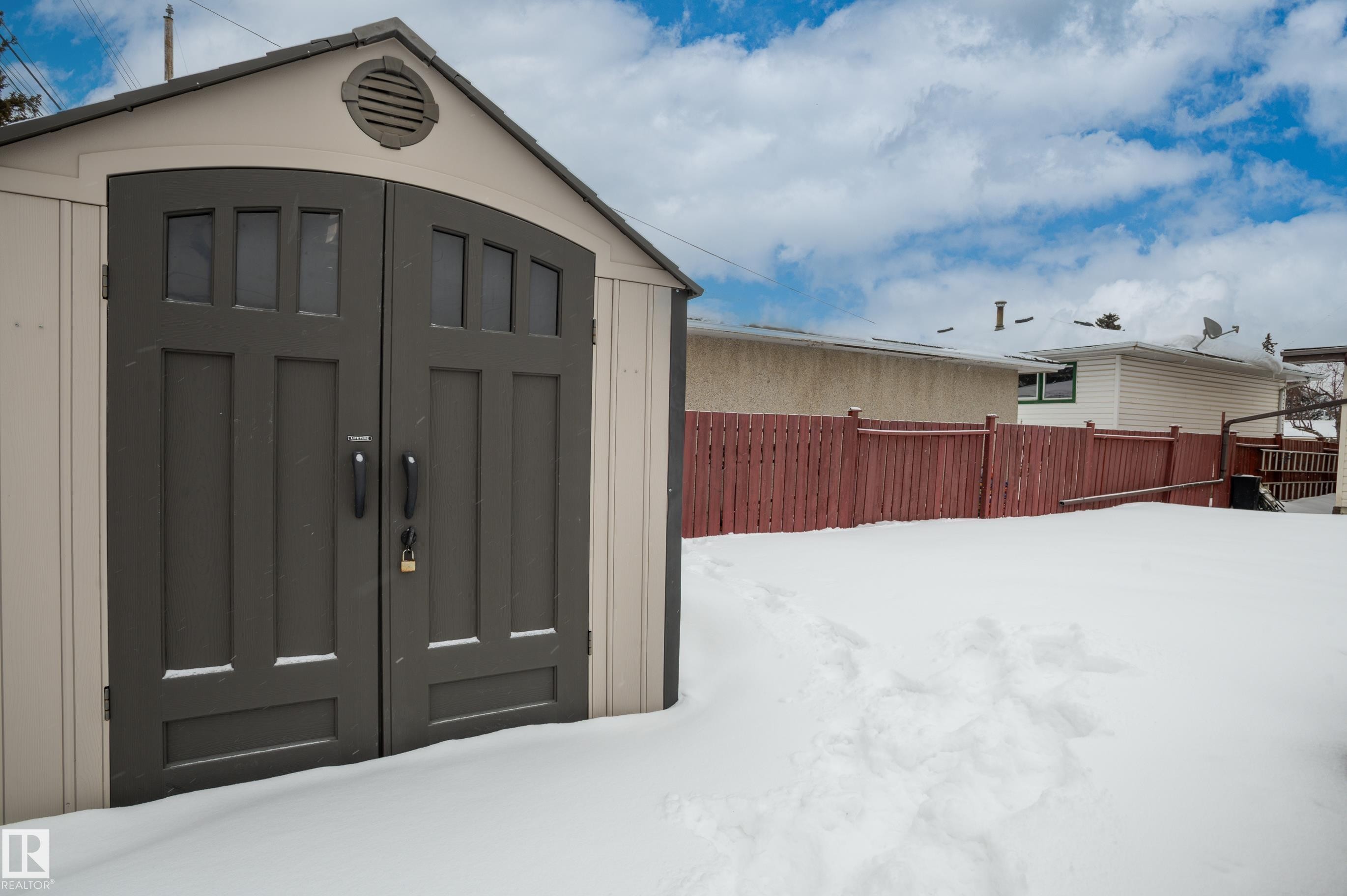 View of snow covered structure - 13420 113A St, Edmonton, AB - Outdoor With Exterior