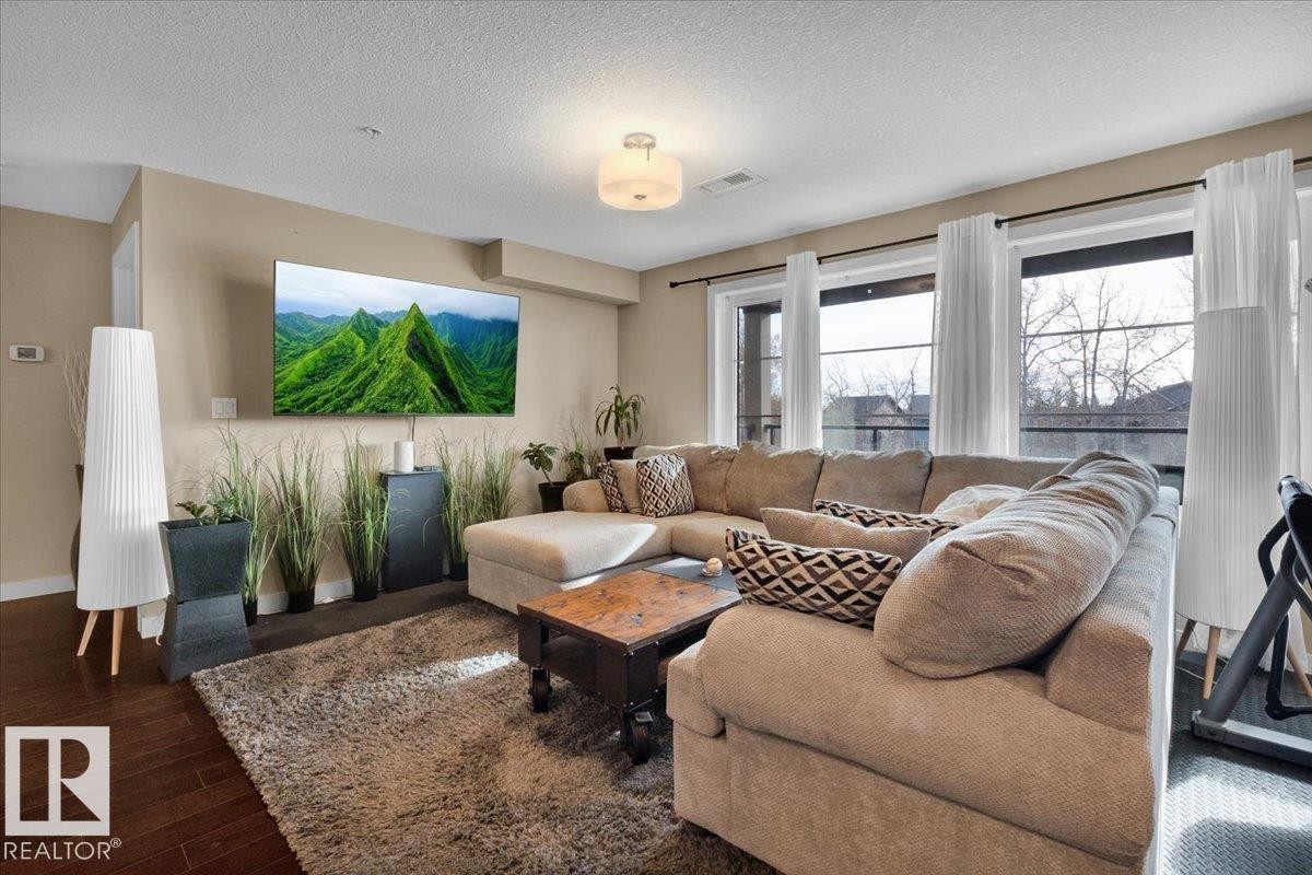 305 5029 Edgemont Boulevard, Edmonton, AB - Indoor Photo Showing Living Room