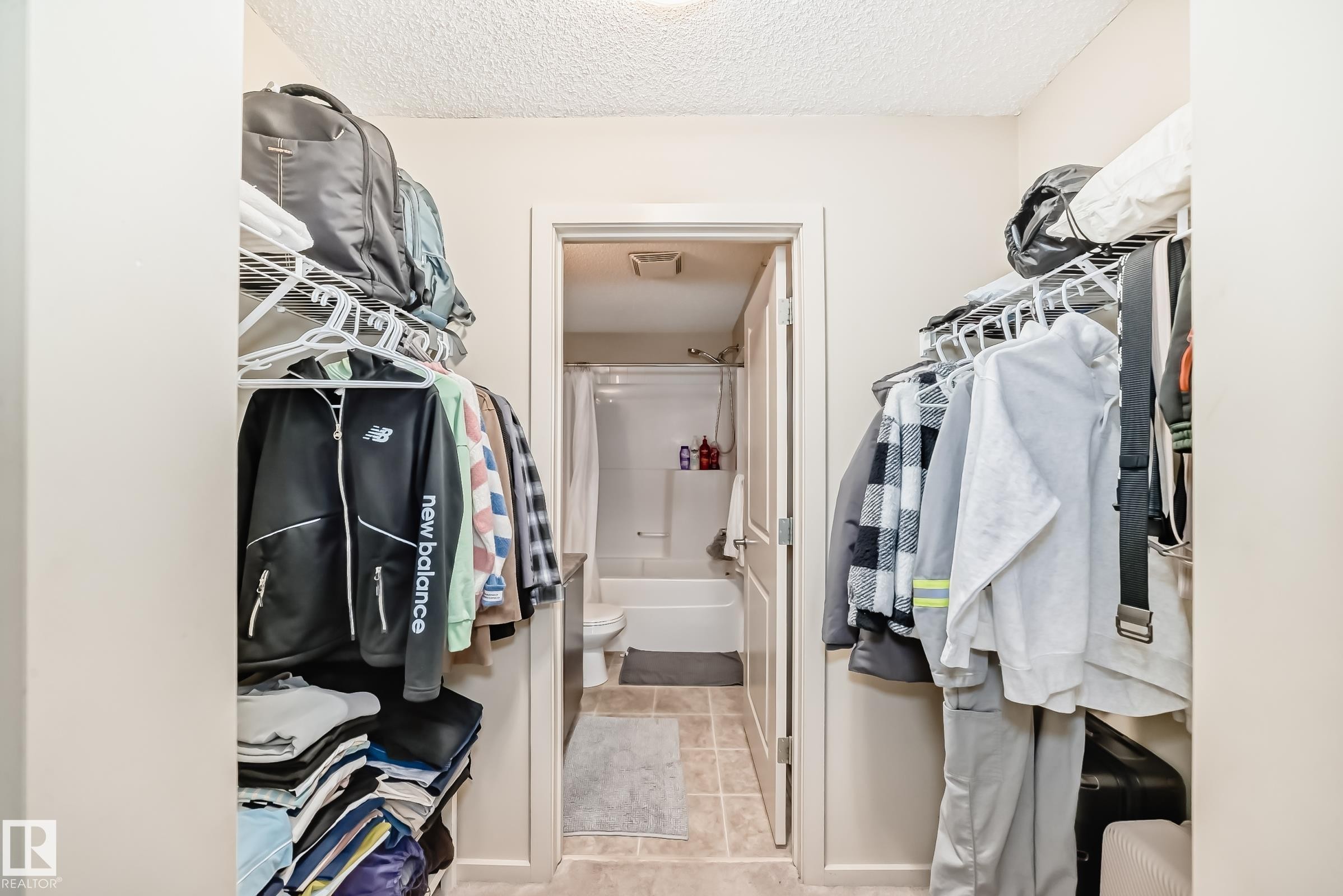View of walk in closet - 403 340 Windermere Road, Edmonton, AB - Indoor Photo Showing Other Room