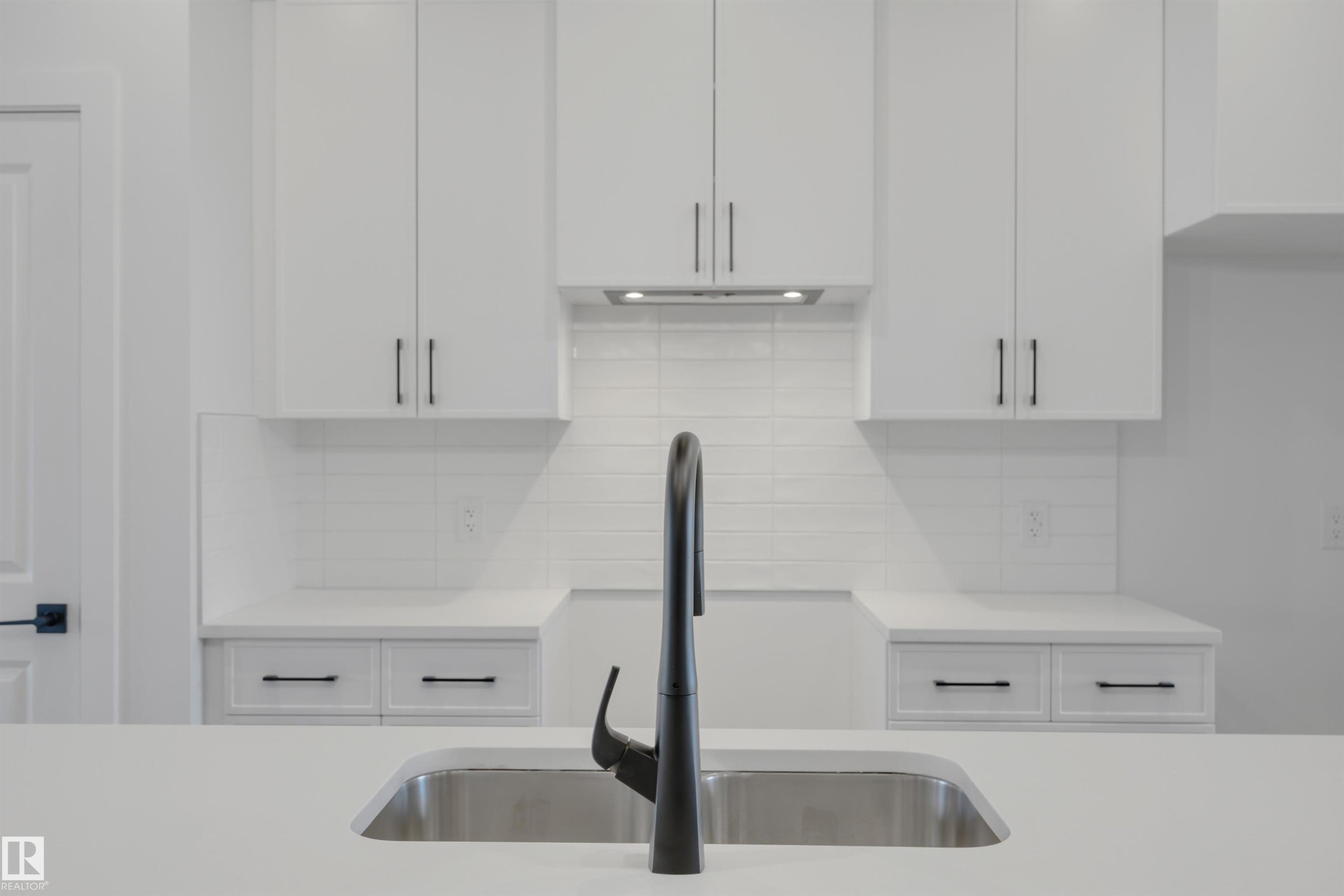 203 Wattle Road, Leduc, AB - Indoor Photo Showing Kitchen With Double Sink
