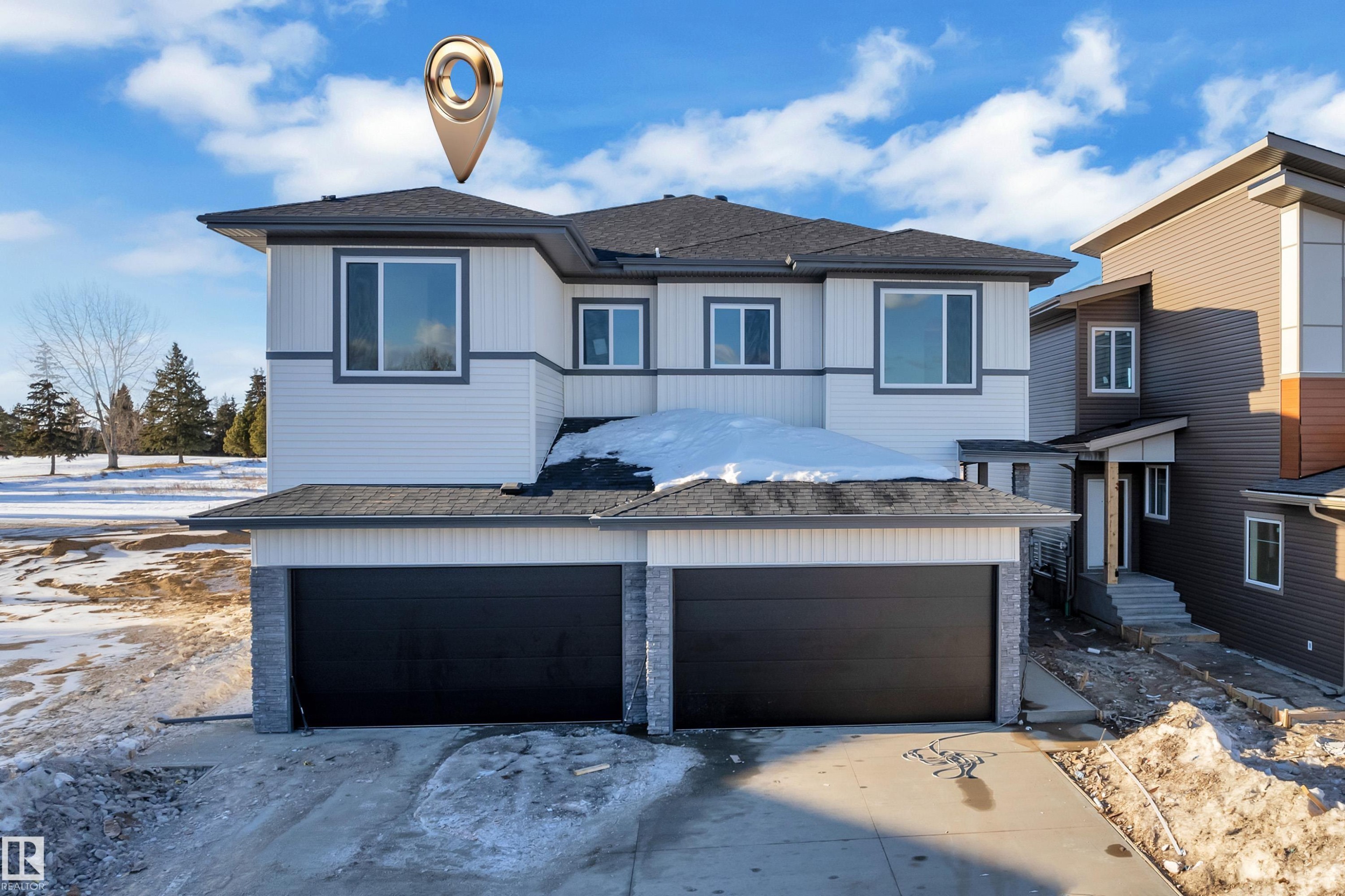 View of front facade featuring a shingled roof, a garage, and driveway - 34 Grayson Green, Stony Plain, AB - Outdoor