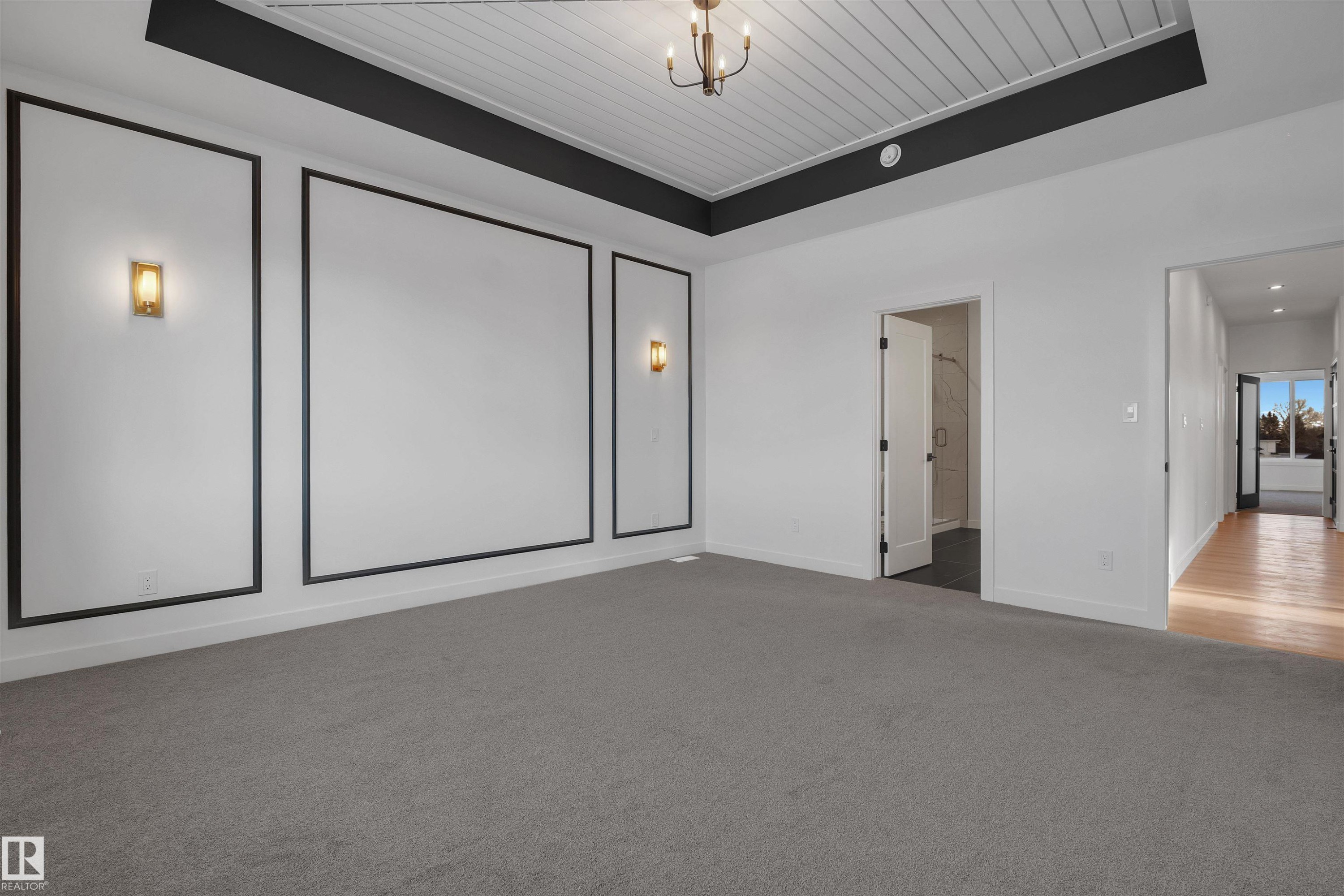 Unfurnished bedroom featuring carpet, a raised ceiling, a chandelier, wood ceiling, and ensuite bathroom - 34 Grayson Green, Stony Plain, AB - Indoor Photo Showing Other Room
