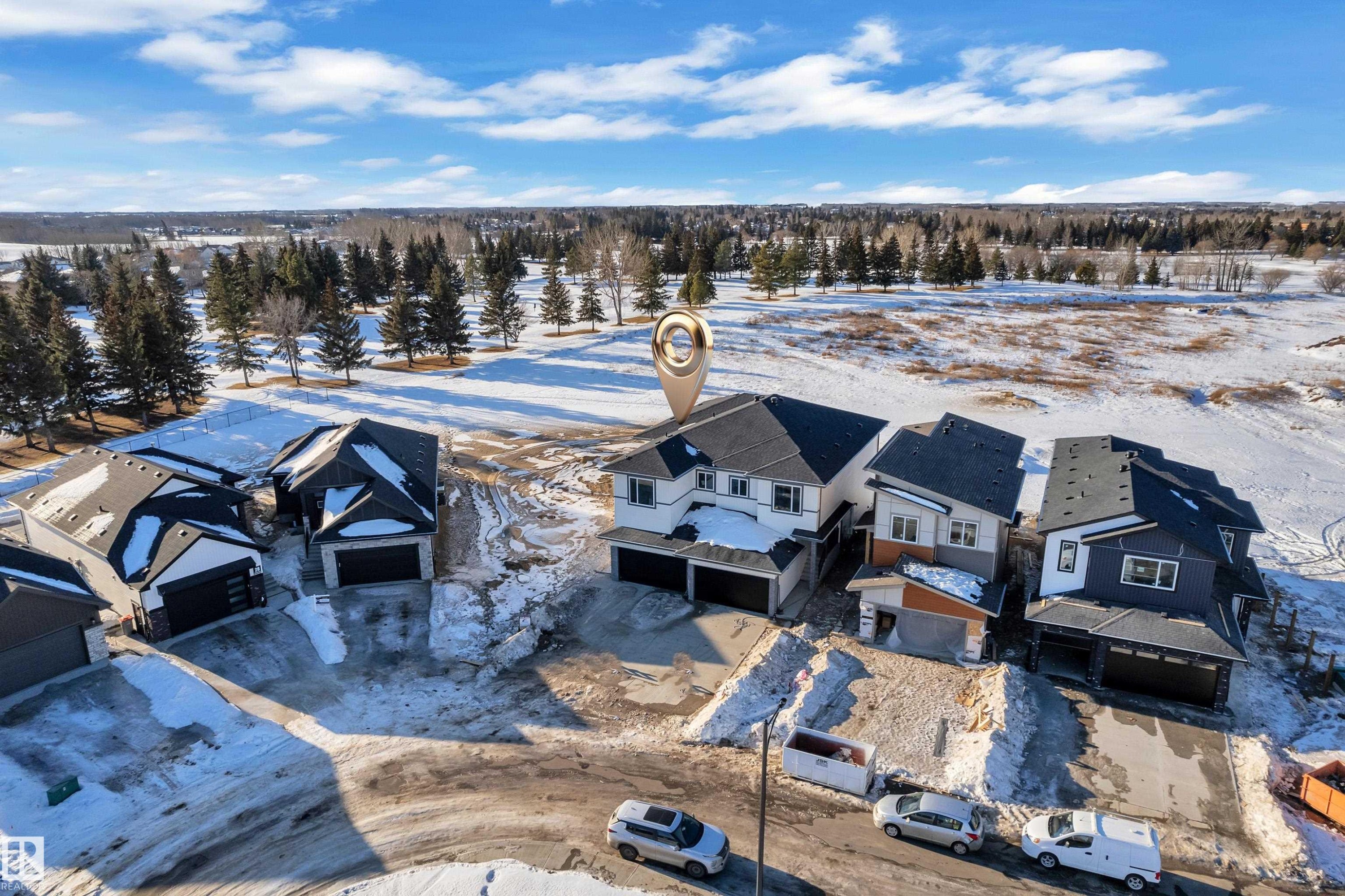 Snowy aerial view featuring a residential view - 34 Grayson Green, Stony Plain, AB - Outdoor With View