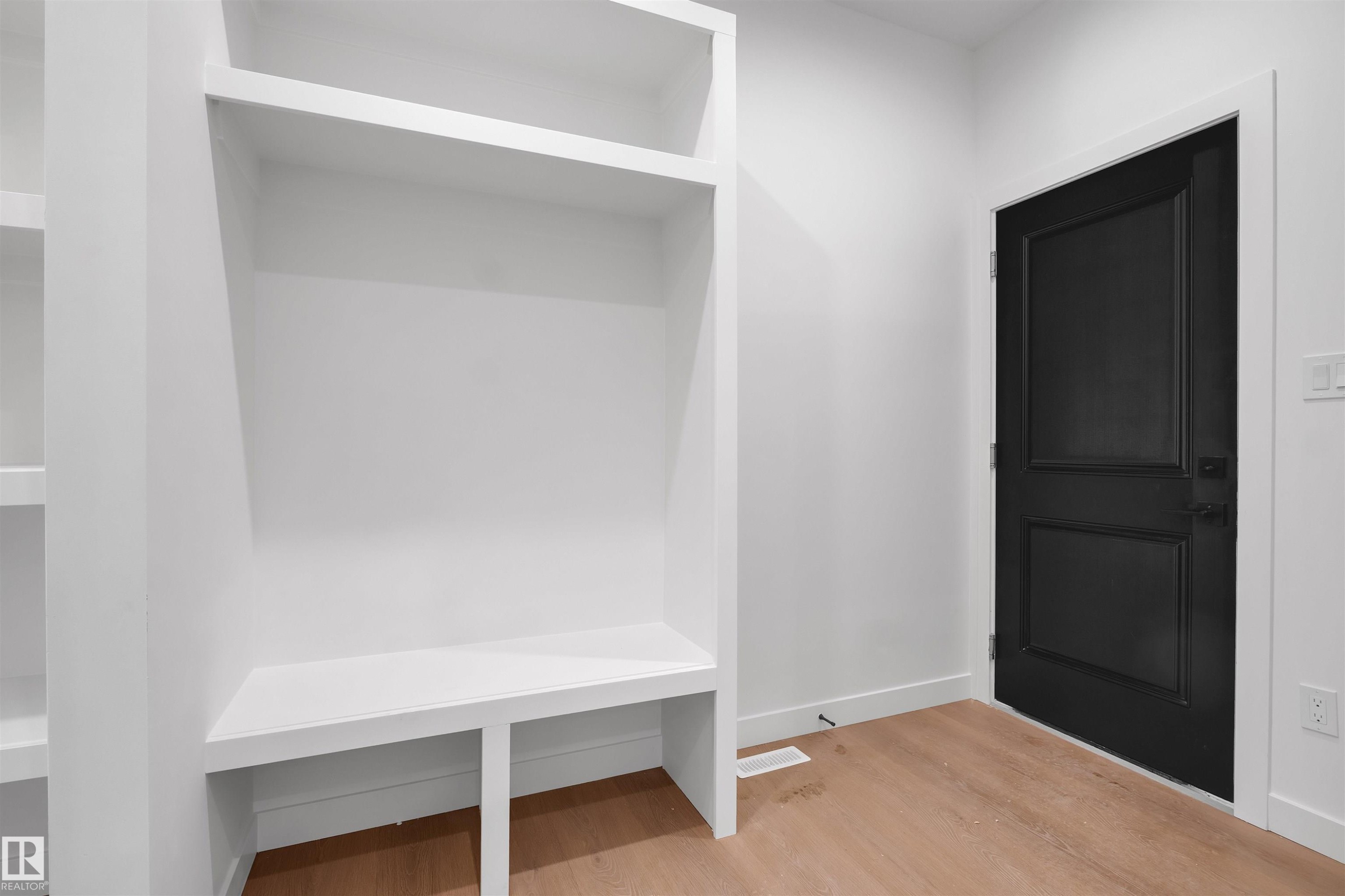 Mudroom featuring light wood-type flooring and baseboards - 34 Grayson Green, Stony Plain, AB - Indoor