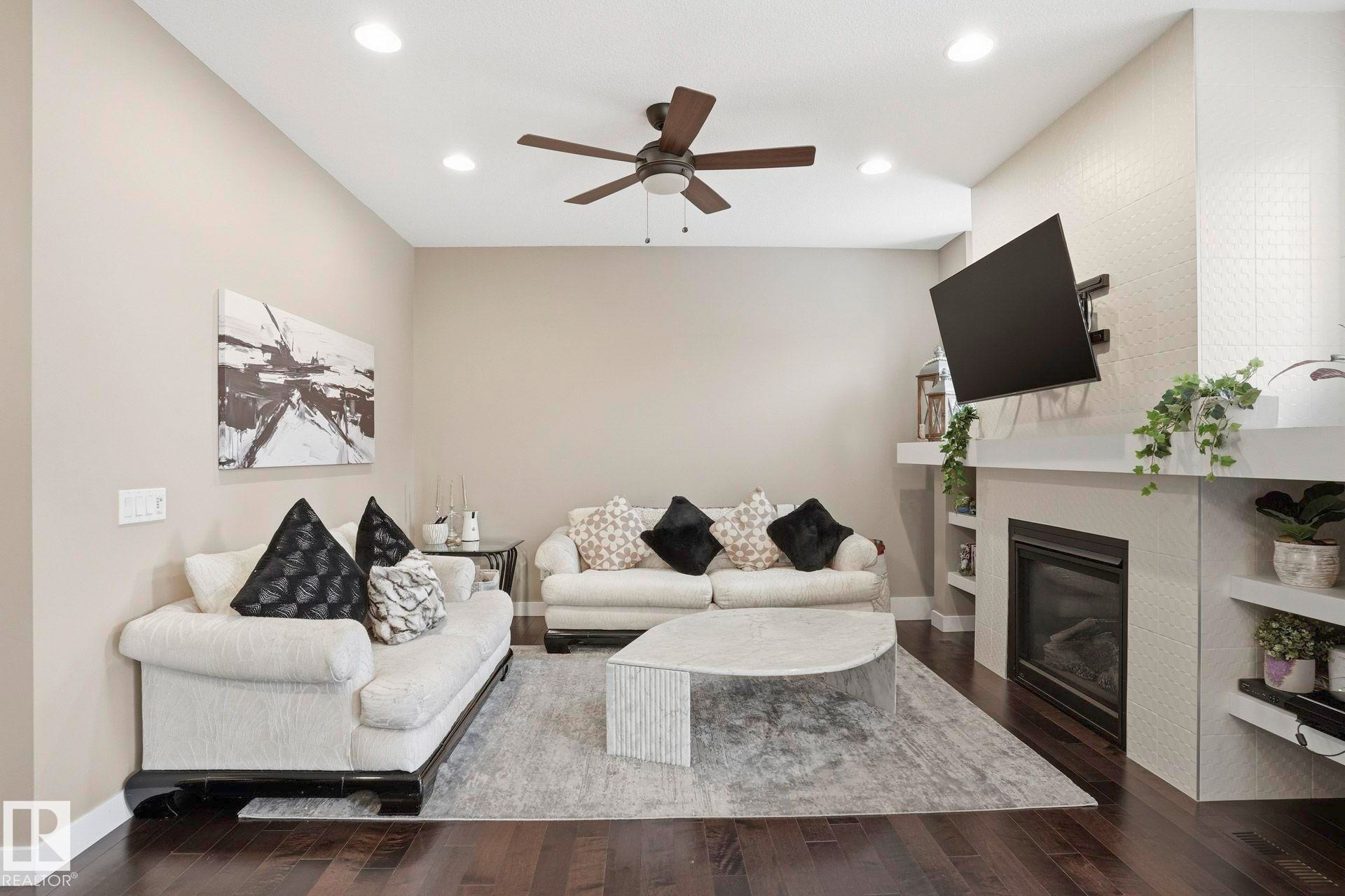 2236 Calhoun Link Link, Edmonton, AB - Indoor Photo Showing Living Room With Fireplace
